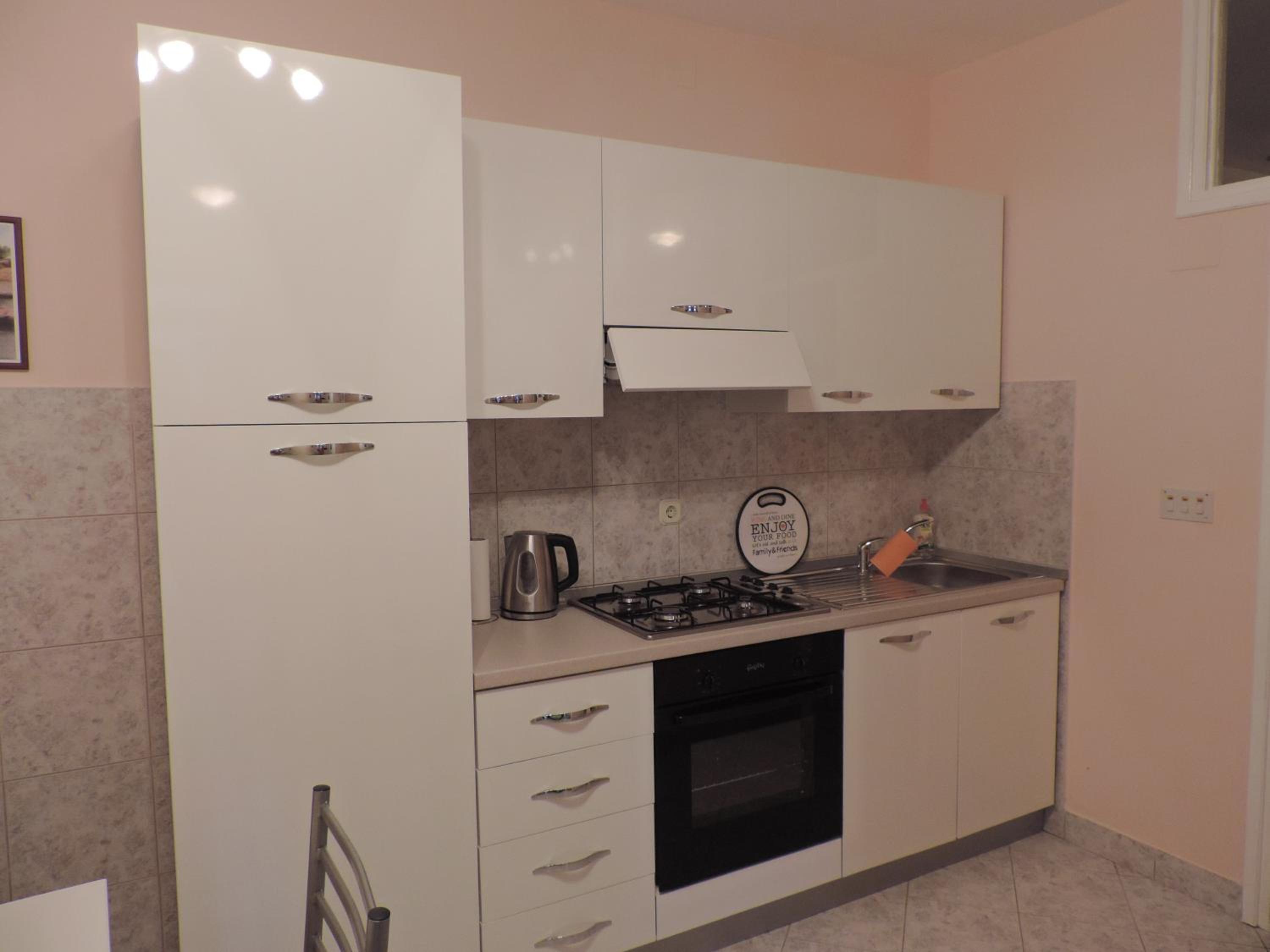 One-Bedroom Apartment with Patio - Photo 5