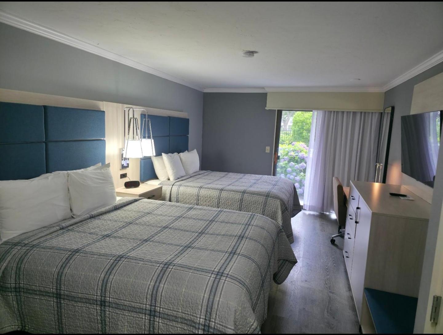 Deluxe Queen Room with Two Queen Beds and Patio - First Floor/Non-Smoking - Photo 1