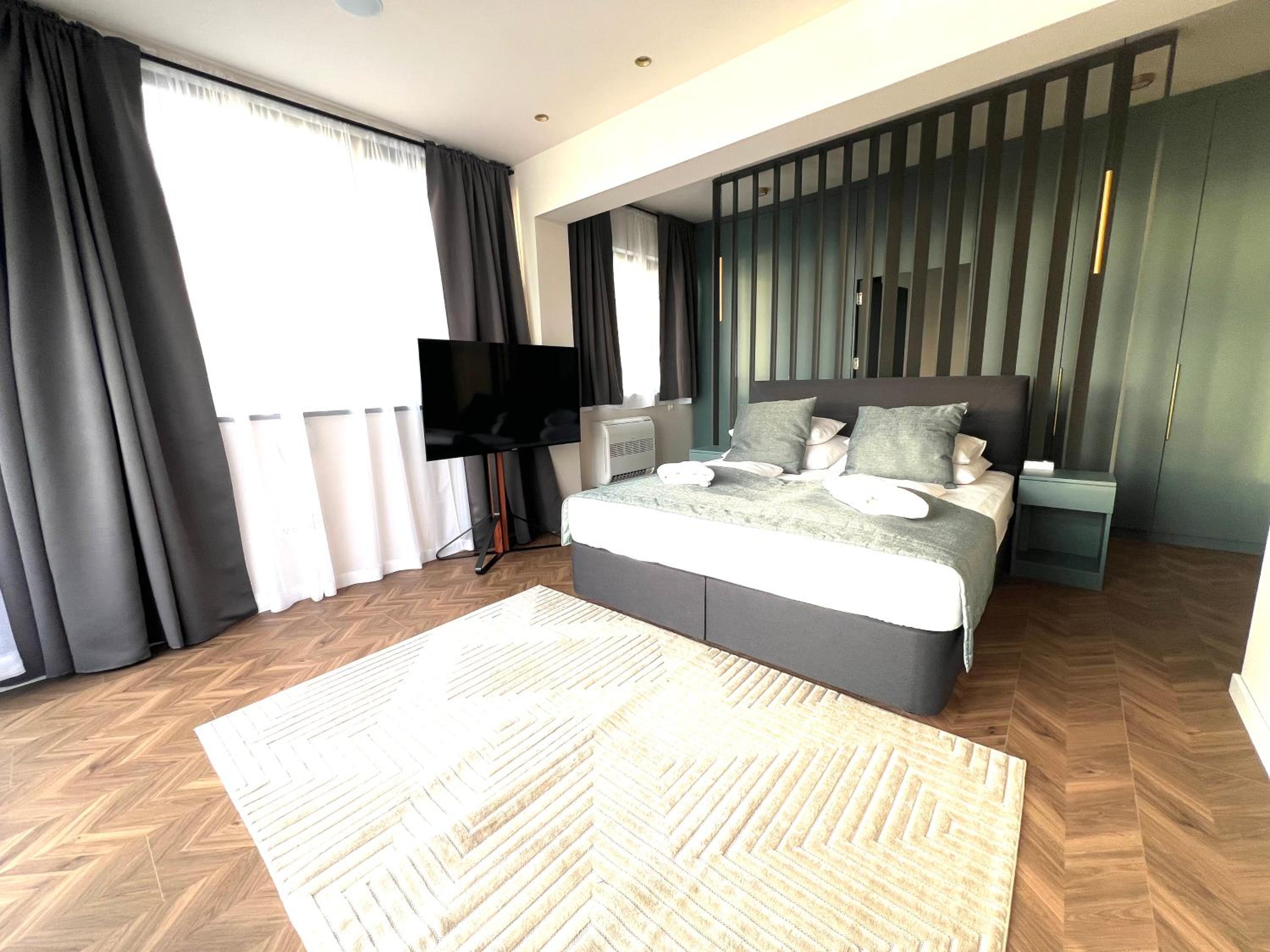 One-Bedroom Apartment with Rooftop Spa Bath photo 1