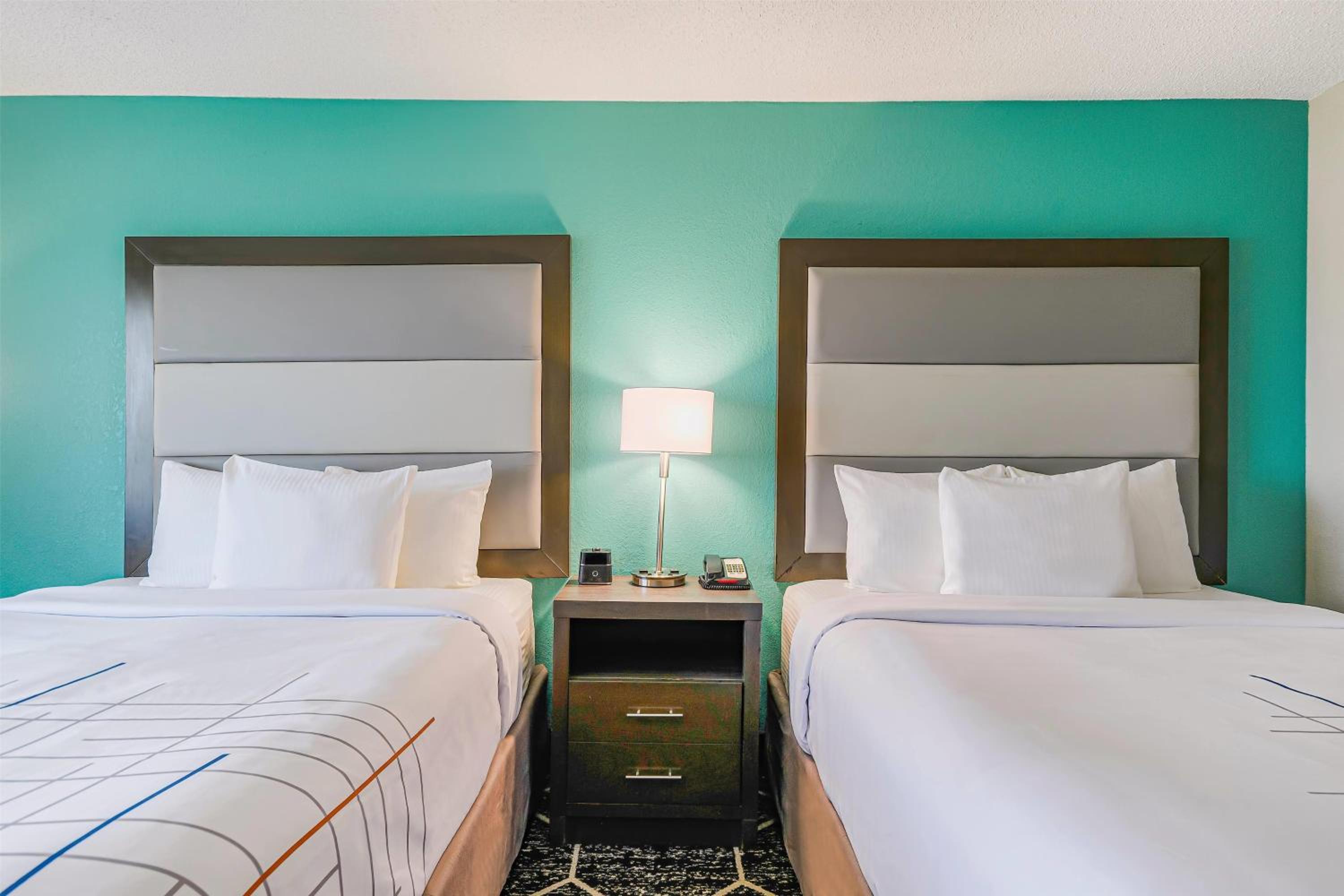 Queen Room with Two Queen Beds - Photo 1