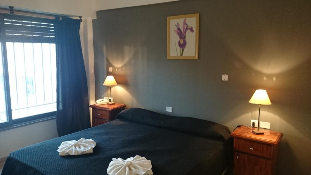 Quadruple Room (2 Single Beds + 1 Double Bed) photo 1