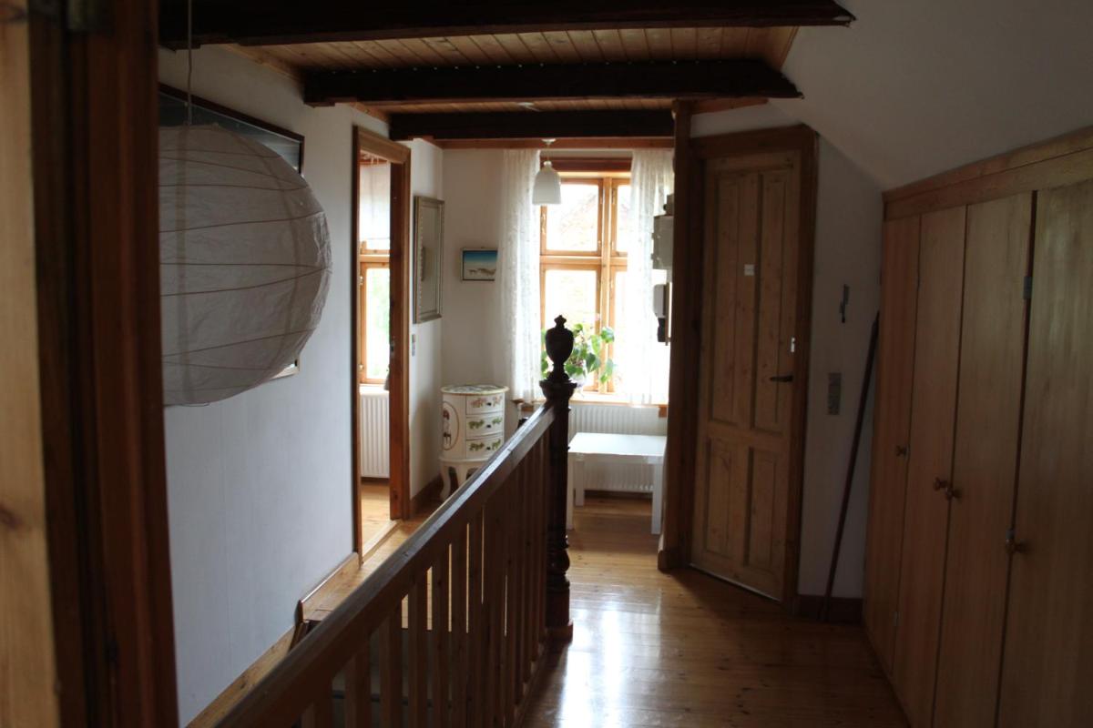 Two-Bedroom Apartment with Private Kitchen & Toilet and Shared Bathroom downstairs photo 1