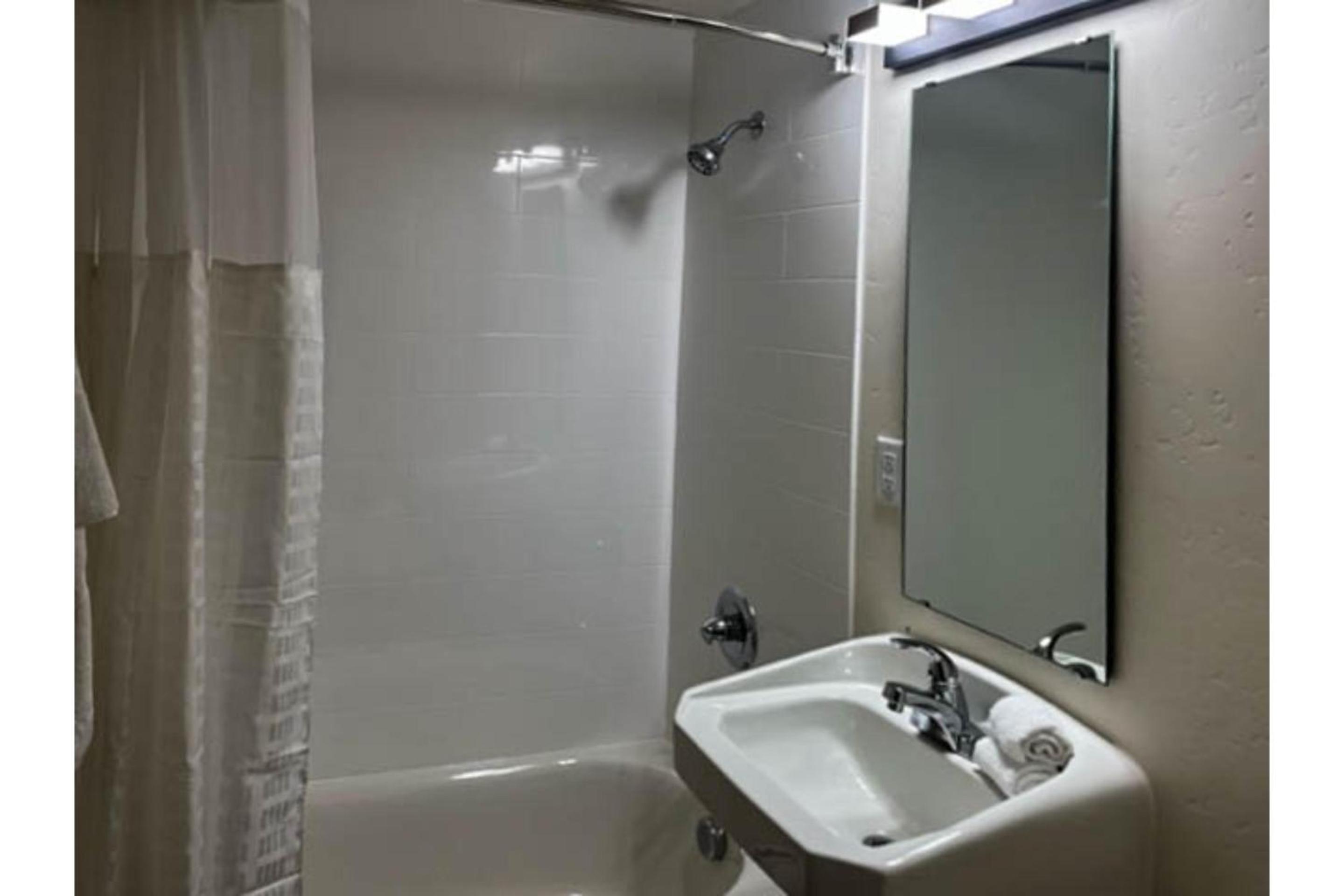 Deluxe Queen Room with Two Queen Beds - Non-Smoking photo 1