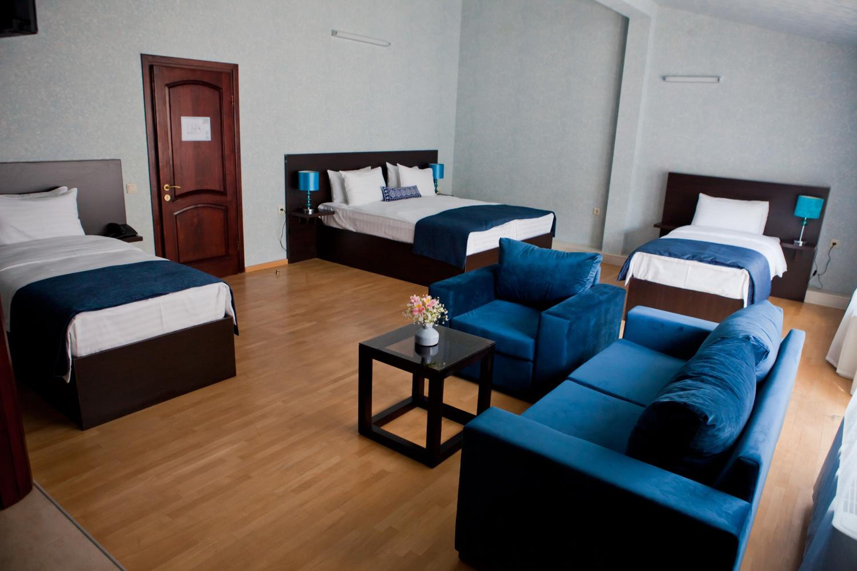Family Suite with Balcony - Photo 1