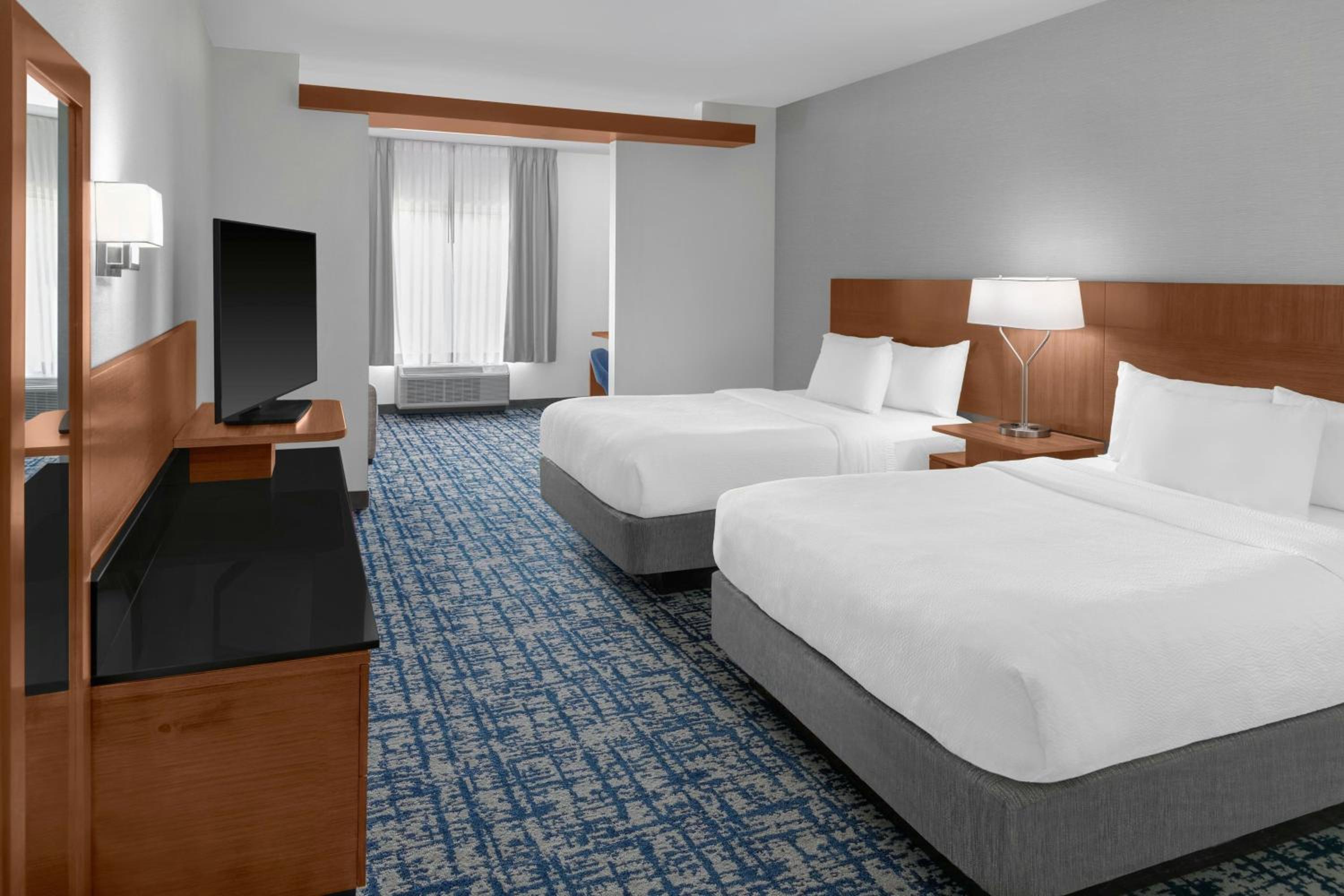 Queen Suite with Two Queen Beds and Sofa Bed photo 1