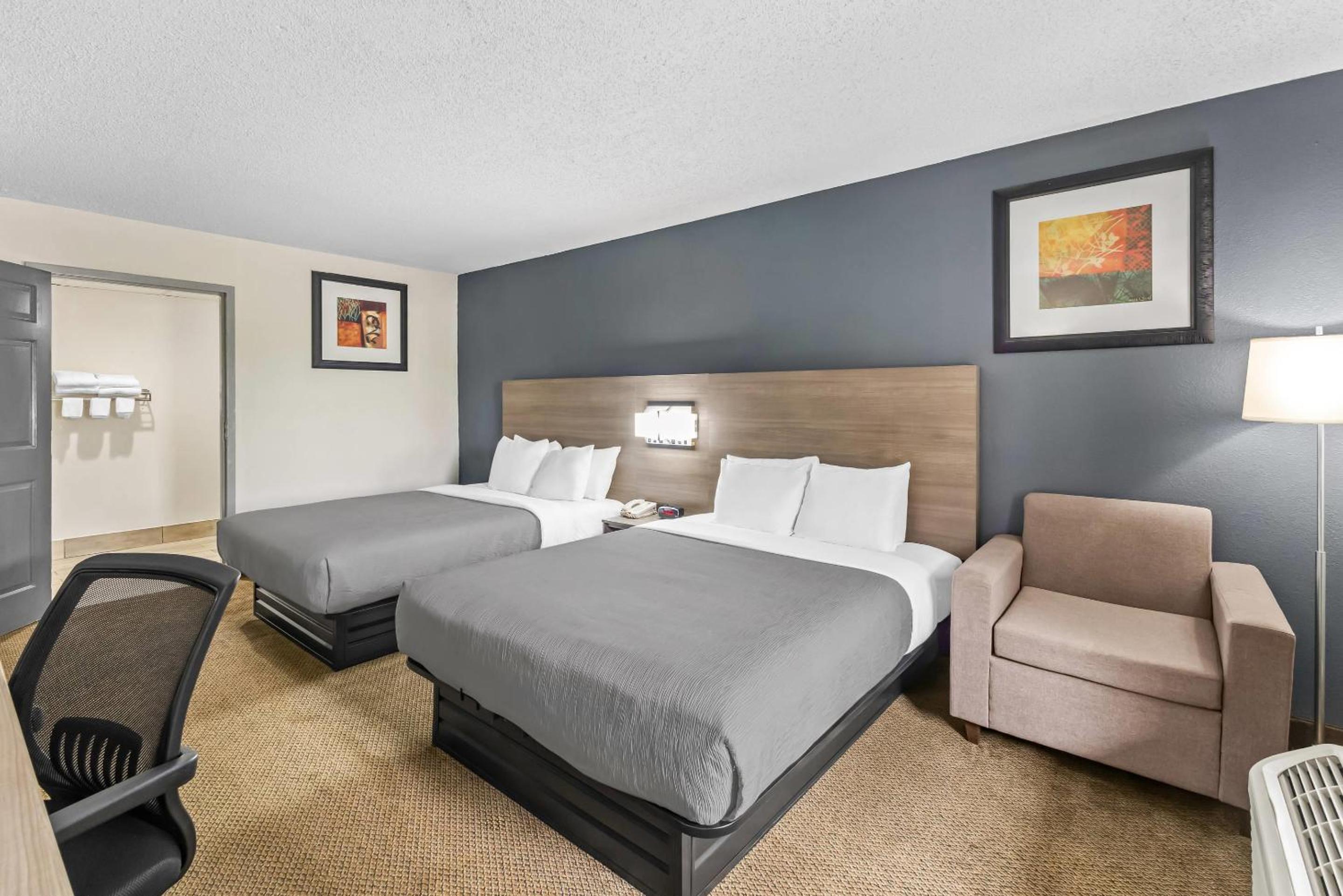 Efficiency Queen Room with Two Queen Beds - Accessible/Smoking - Photo 1