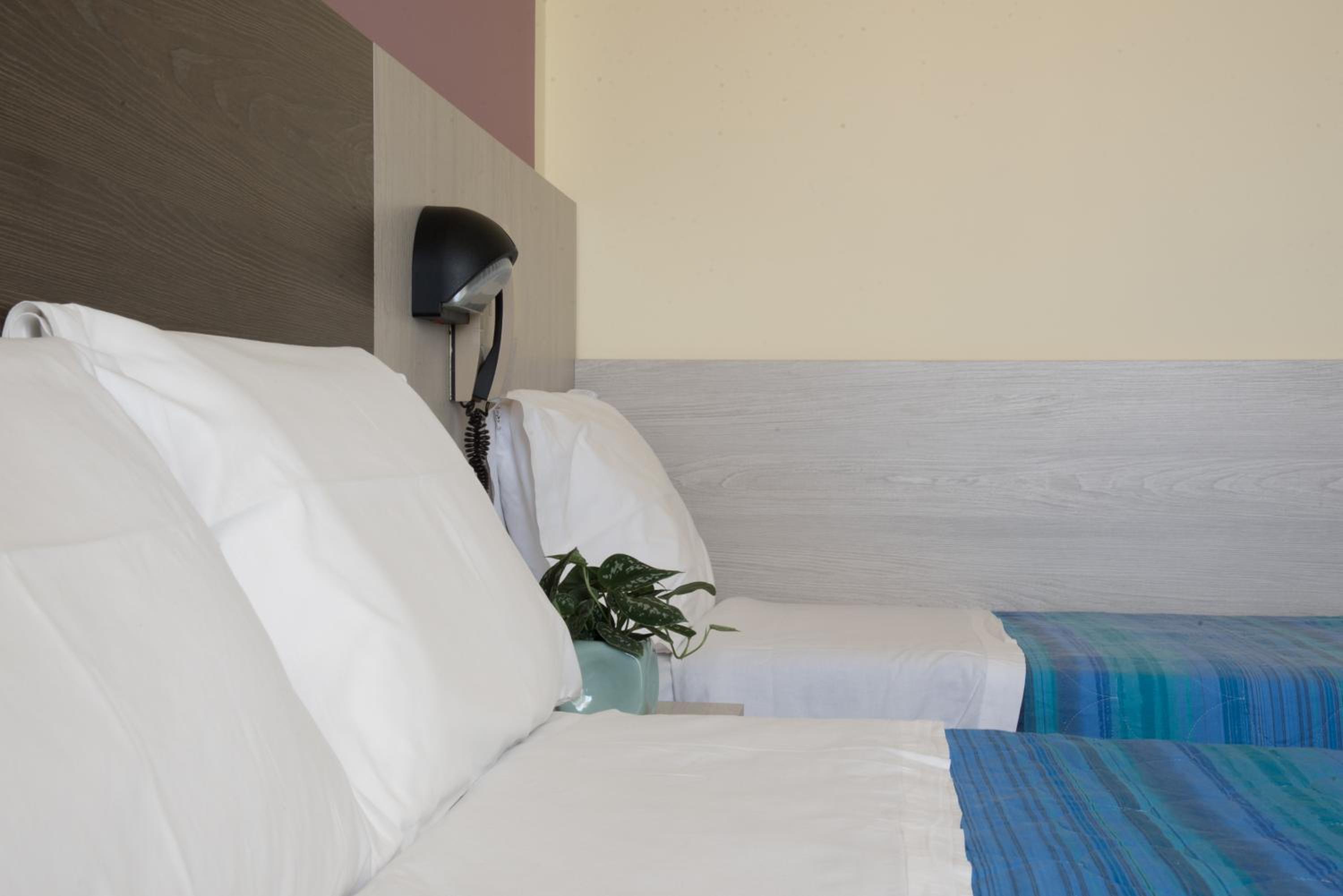 Economy Triple Room - Beach access photo 2