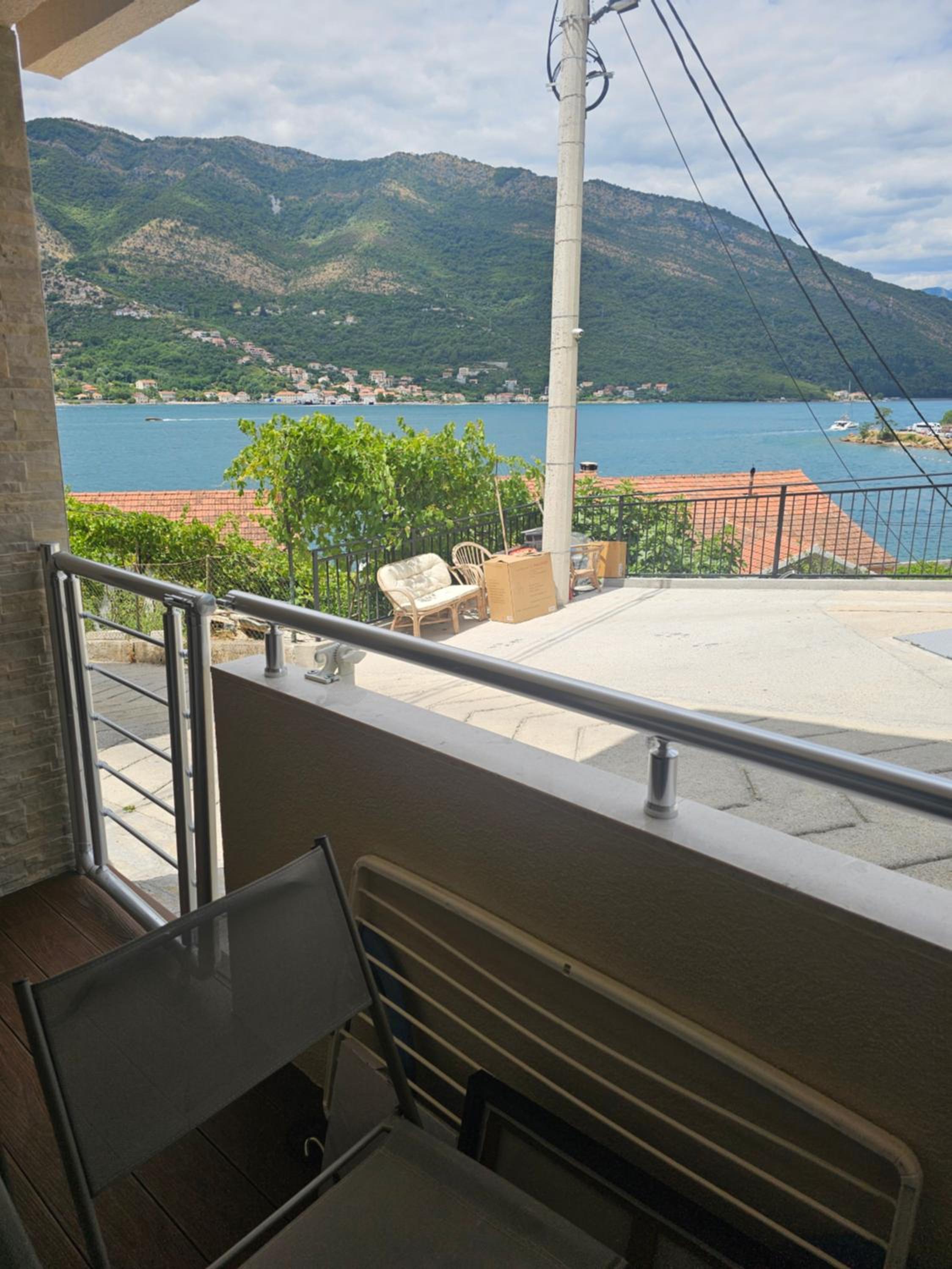 One-Bedroom Apartment with Balcony and Sea View