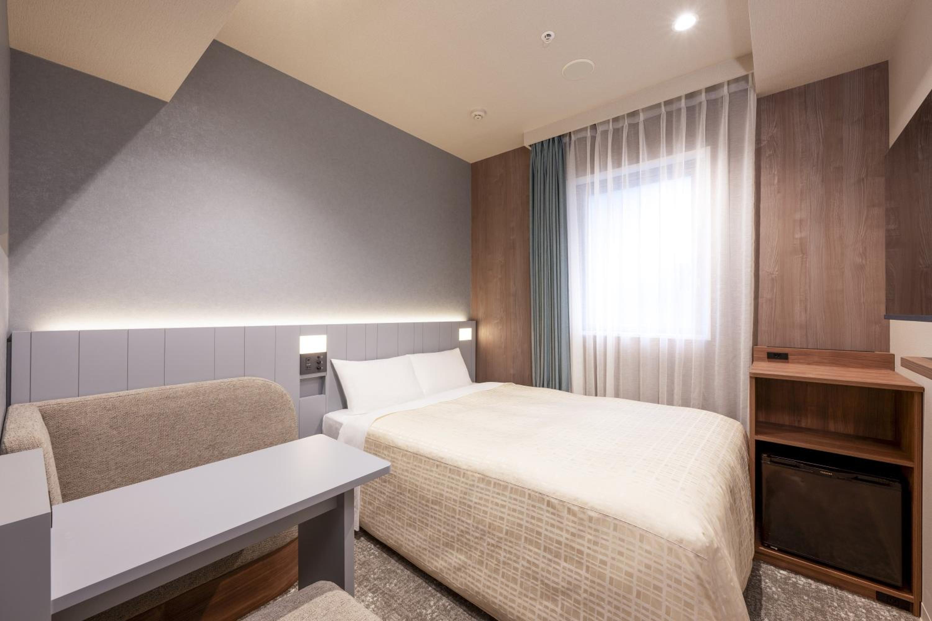 Renovated Double Room (1 adult) - Non-Smoking (Room size 12 SQM, Bed width 55 in)
