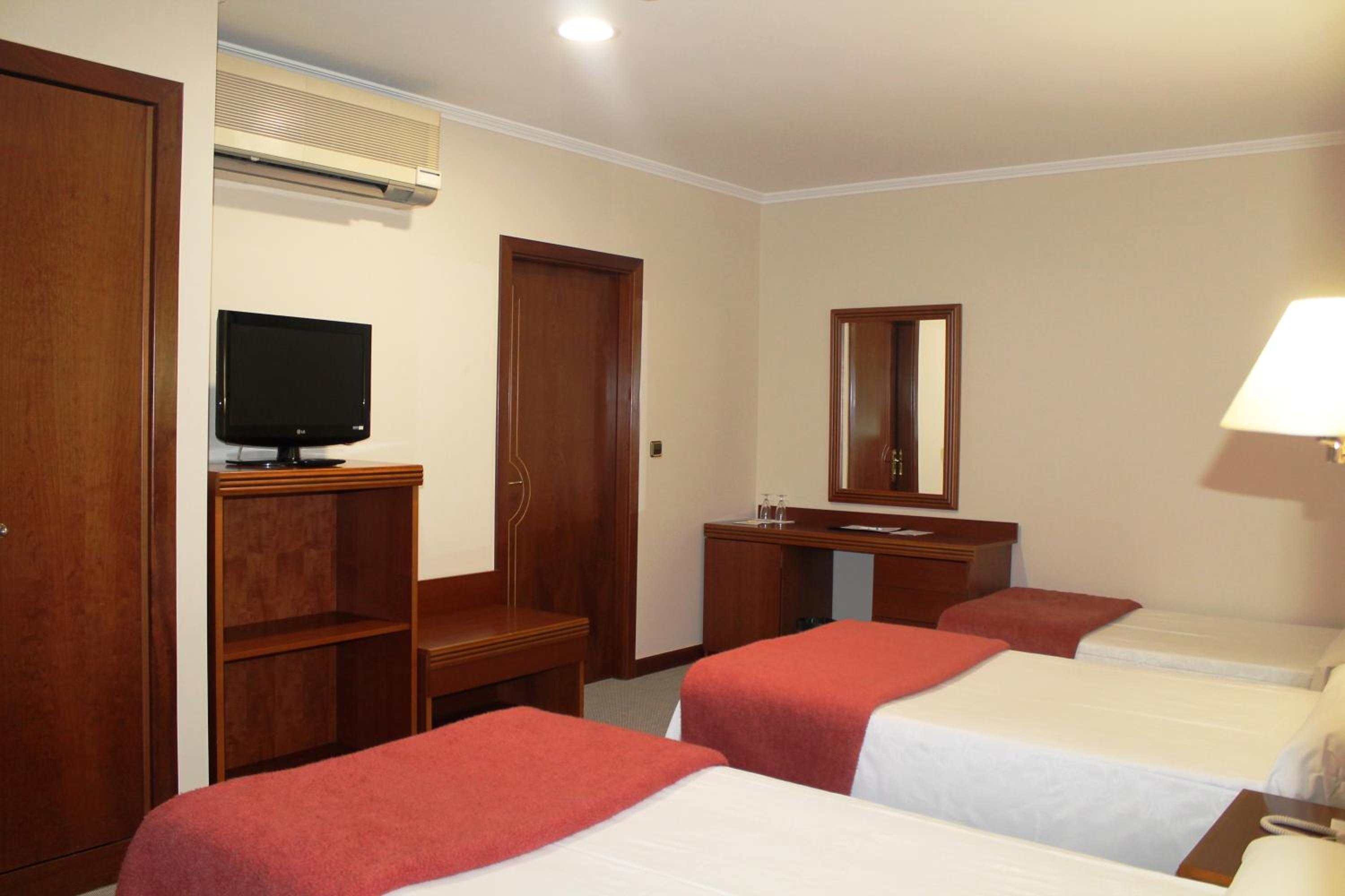 Basic Triple Room - Photo 1