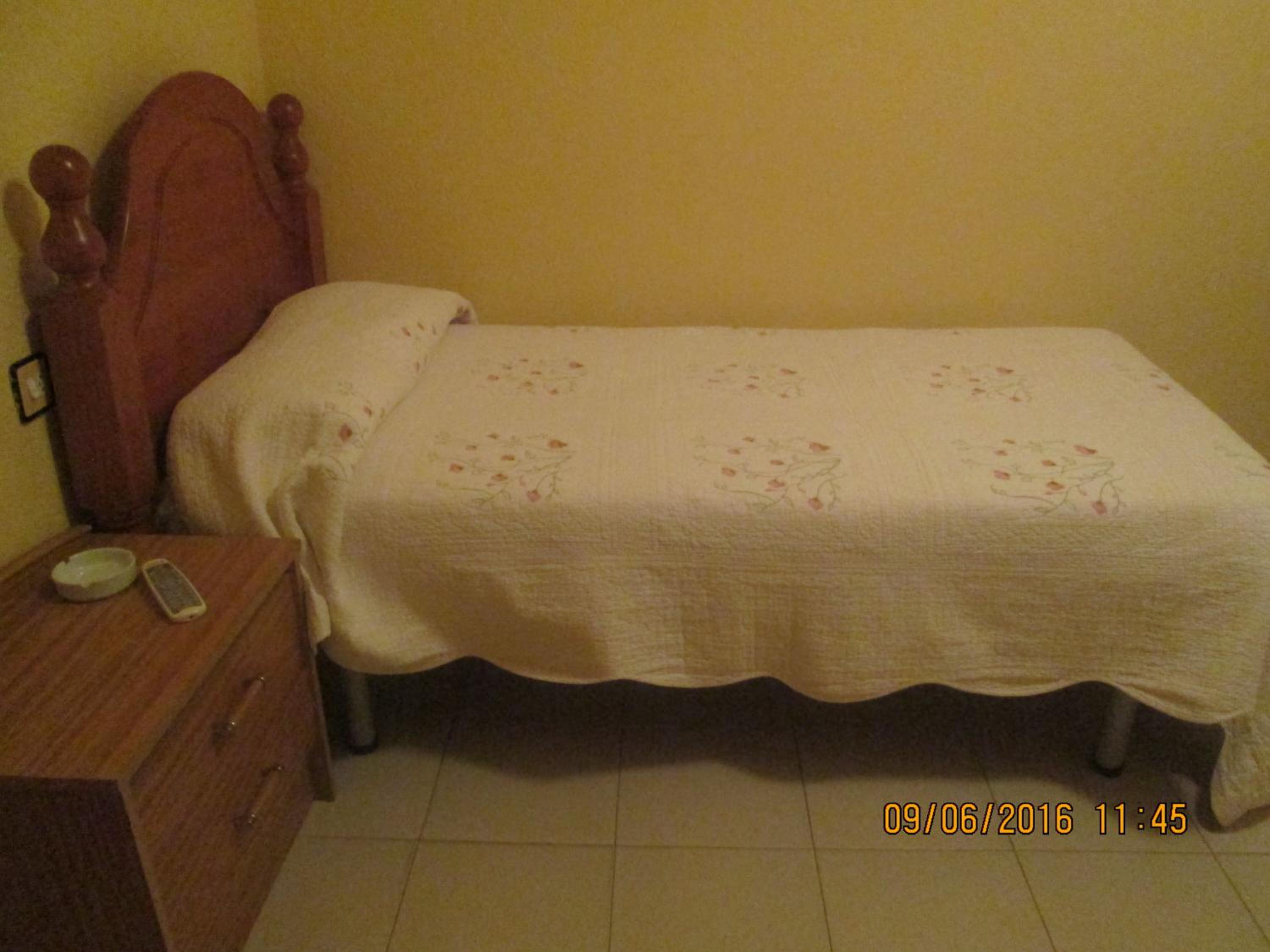Habitación individual con baño compartido