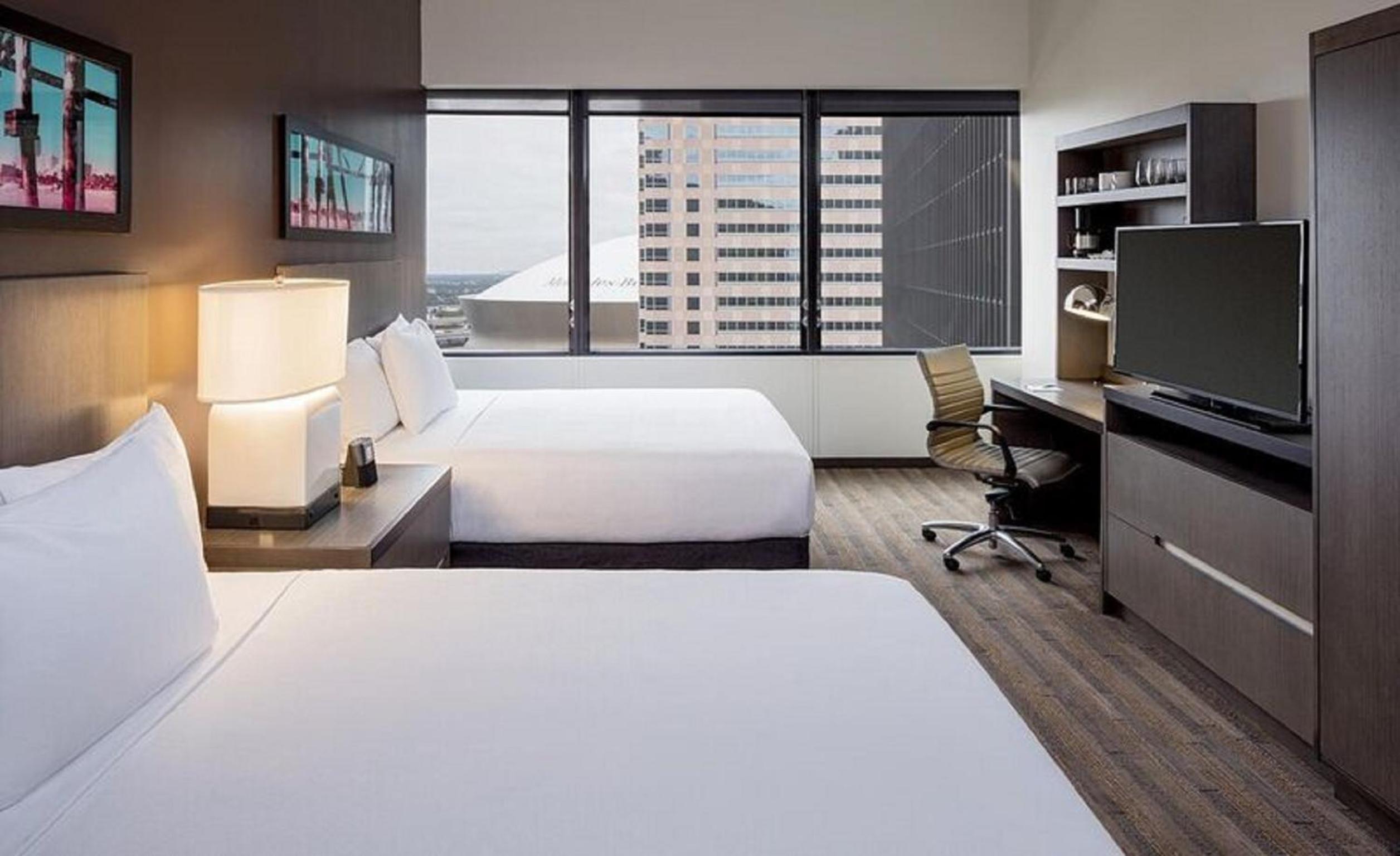 Queen Room with Two Queen Beds and Shower - High Floor photo 2