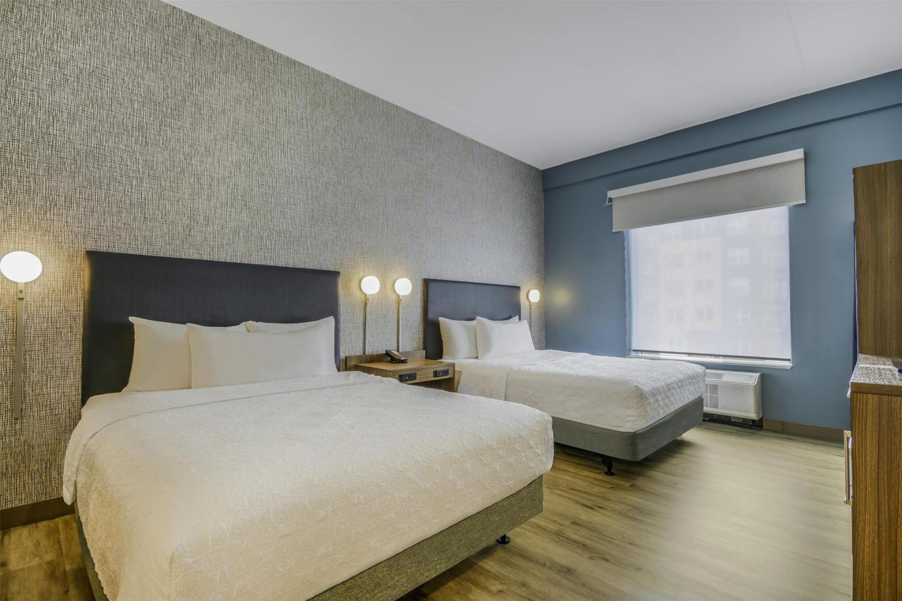 Suite with Two Queen Beds and Tub - Mobility Accessible - Photo 1