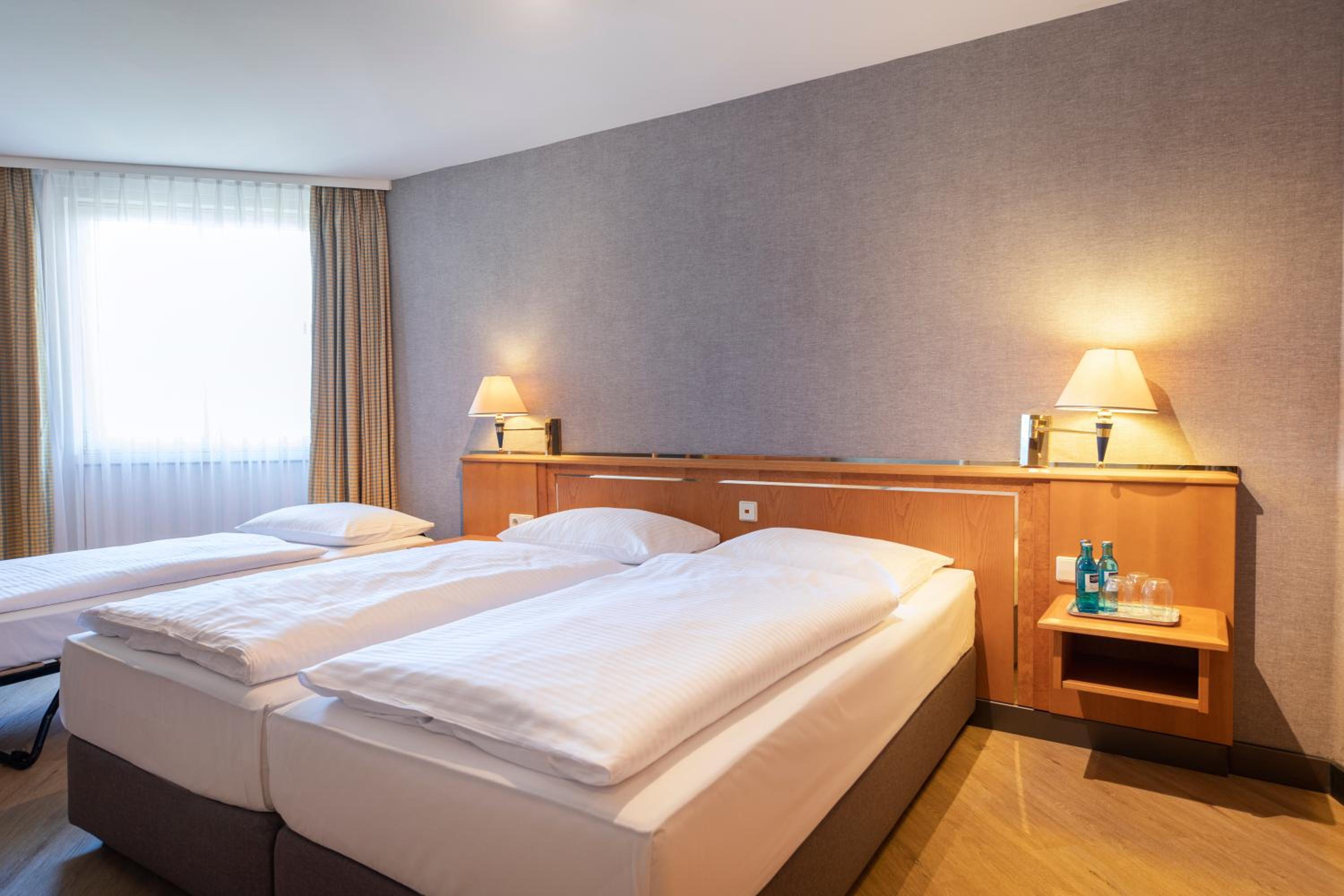 Economy Triple Room - Photo 3