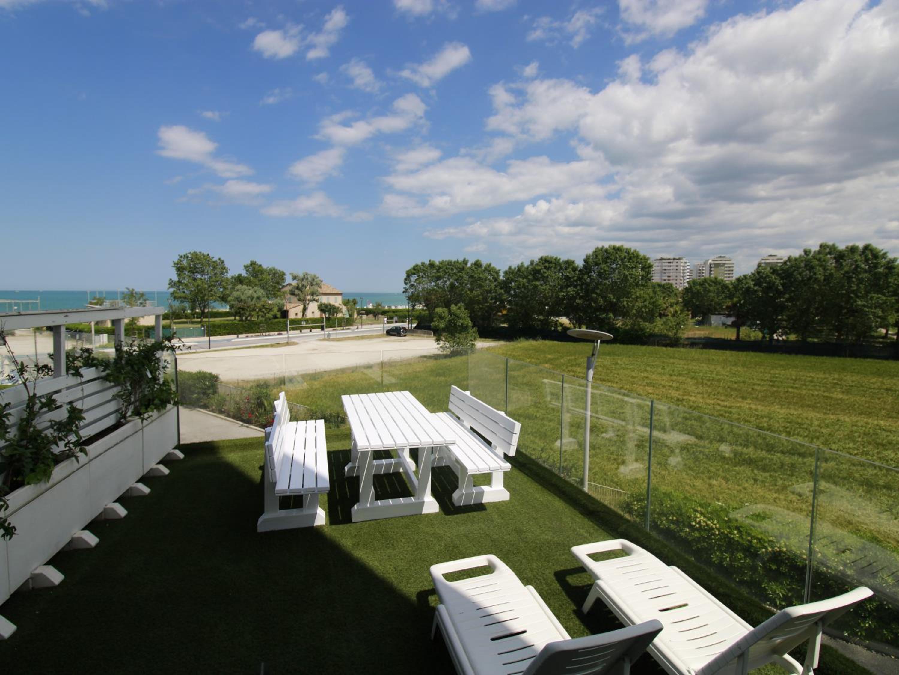 Sea Front Apartment with Grass Terrace and Balcony