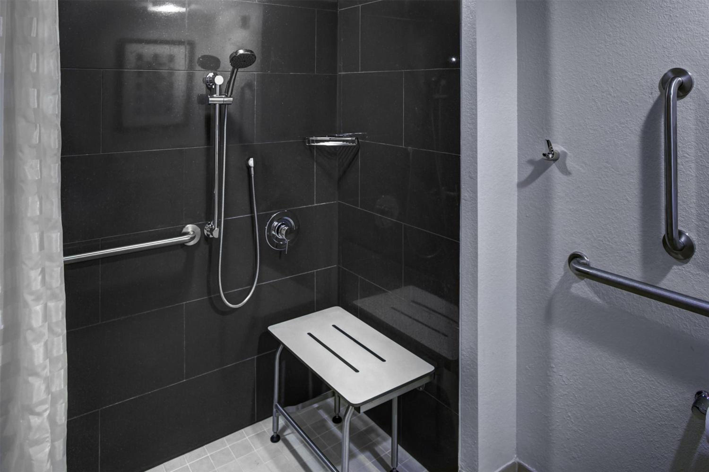 Two-Bedroom King Room with Double Beds and Roll-In Shower - Mobility Accessible photo 2
