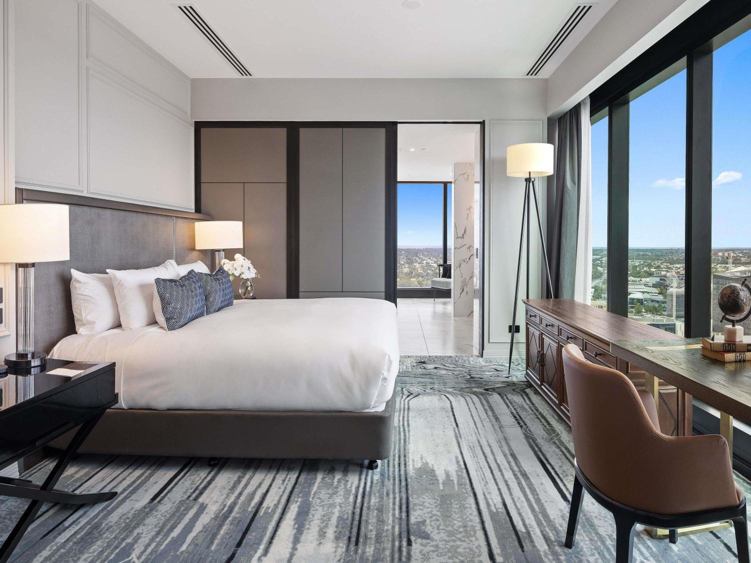 One-Bedroom King Presidential Suite with Living and Dining Room and Panorama View