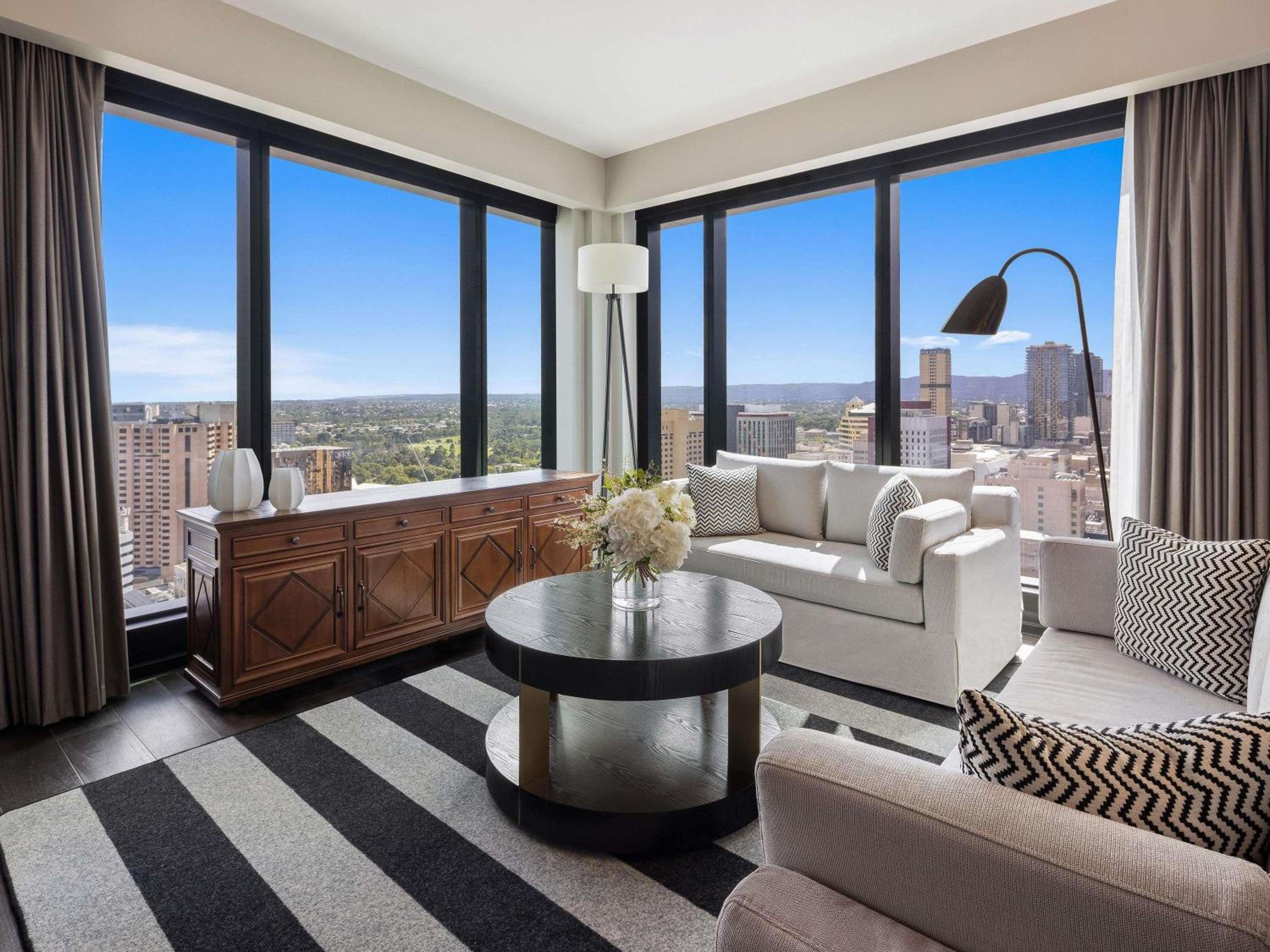 One-Bedroom King Presidential Suite with Living and Dining Room and Panorama View