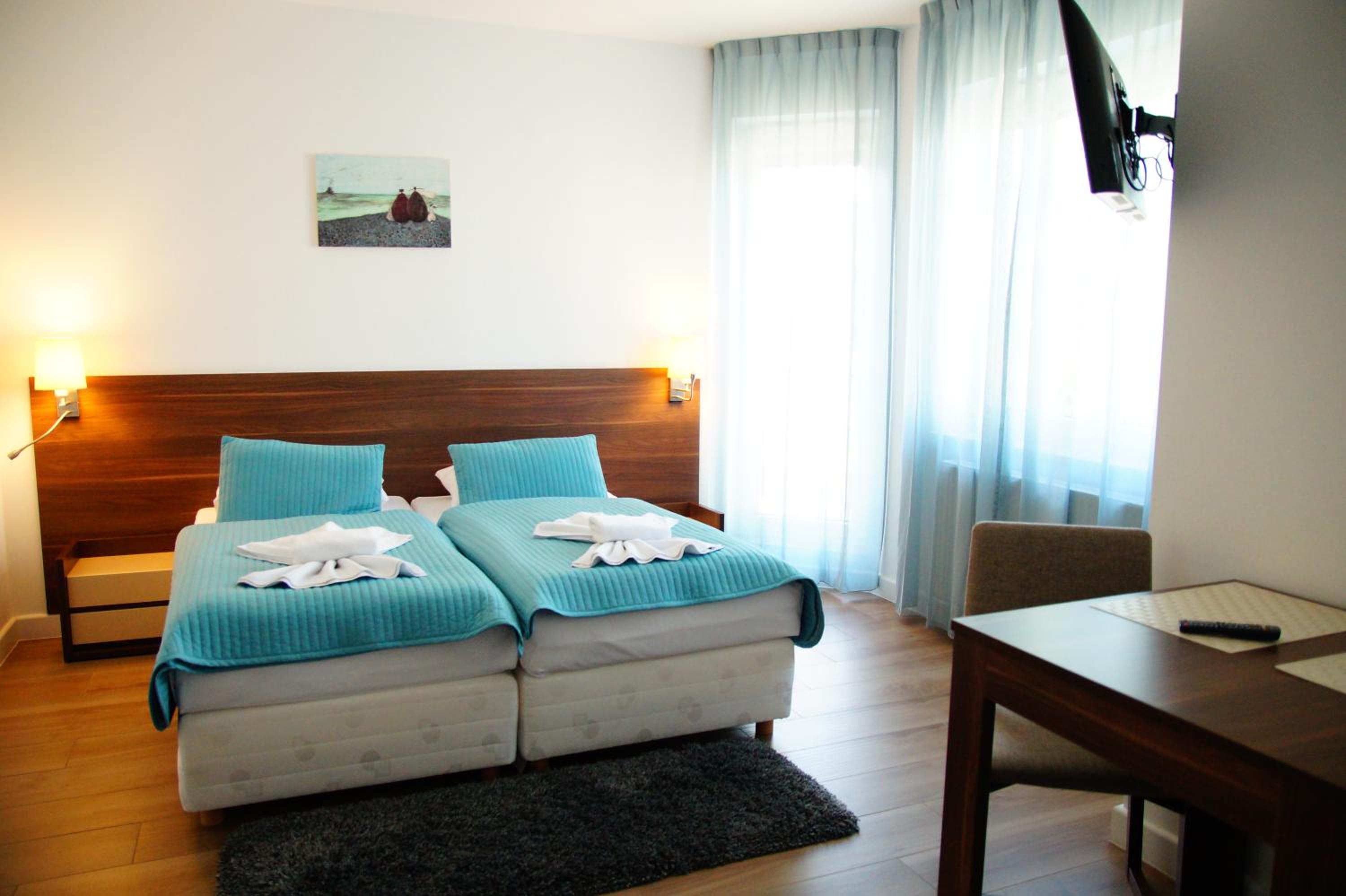 Deluxe Double Room with Balcony - Photo 1