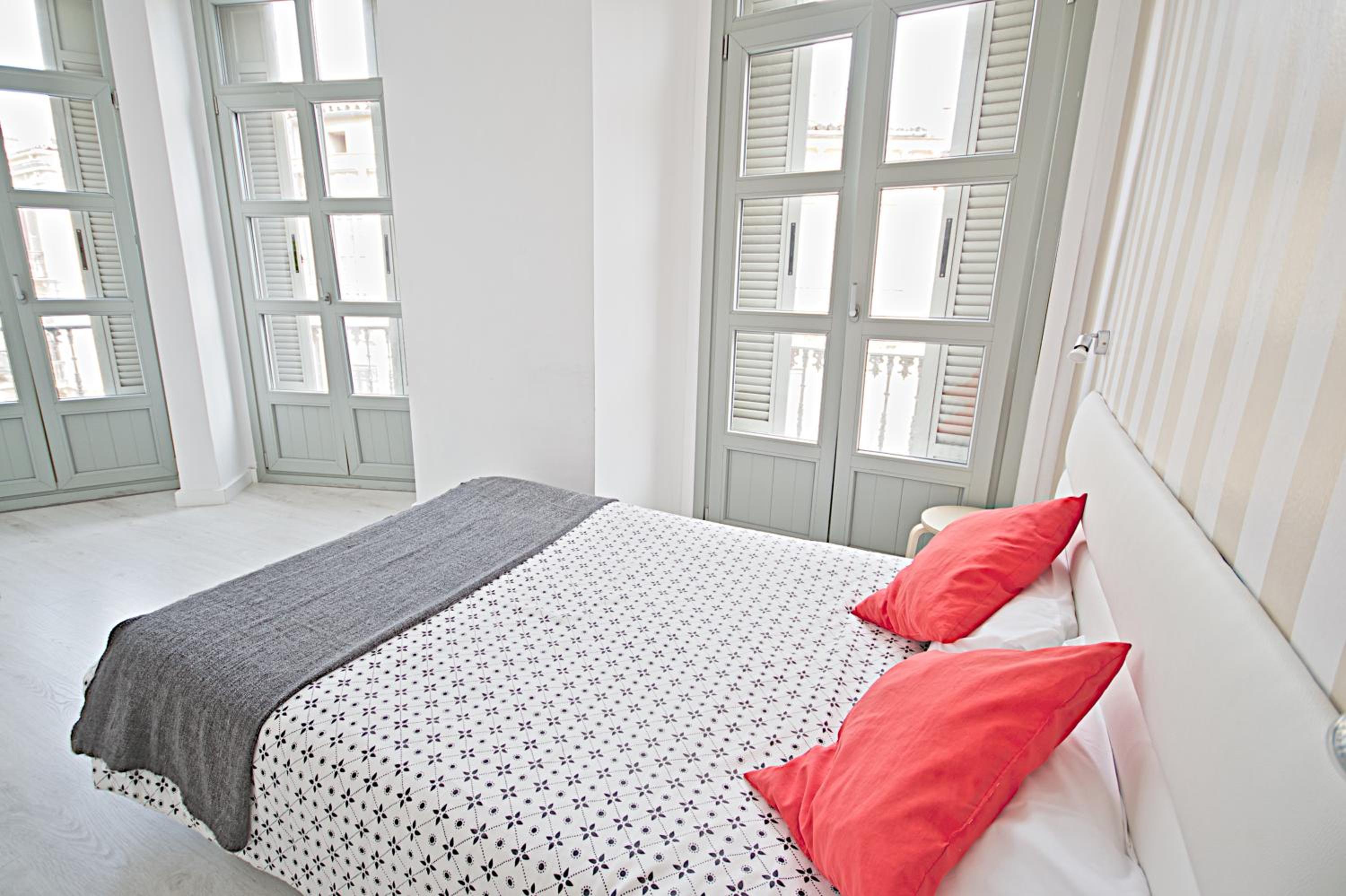 One-Bedroom Apartment with Balcony and City View