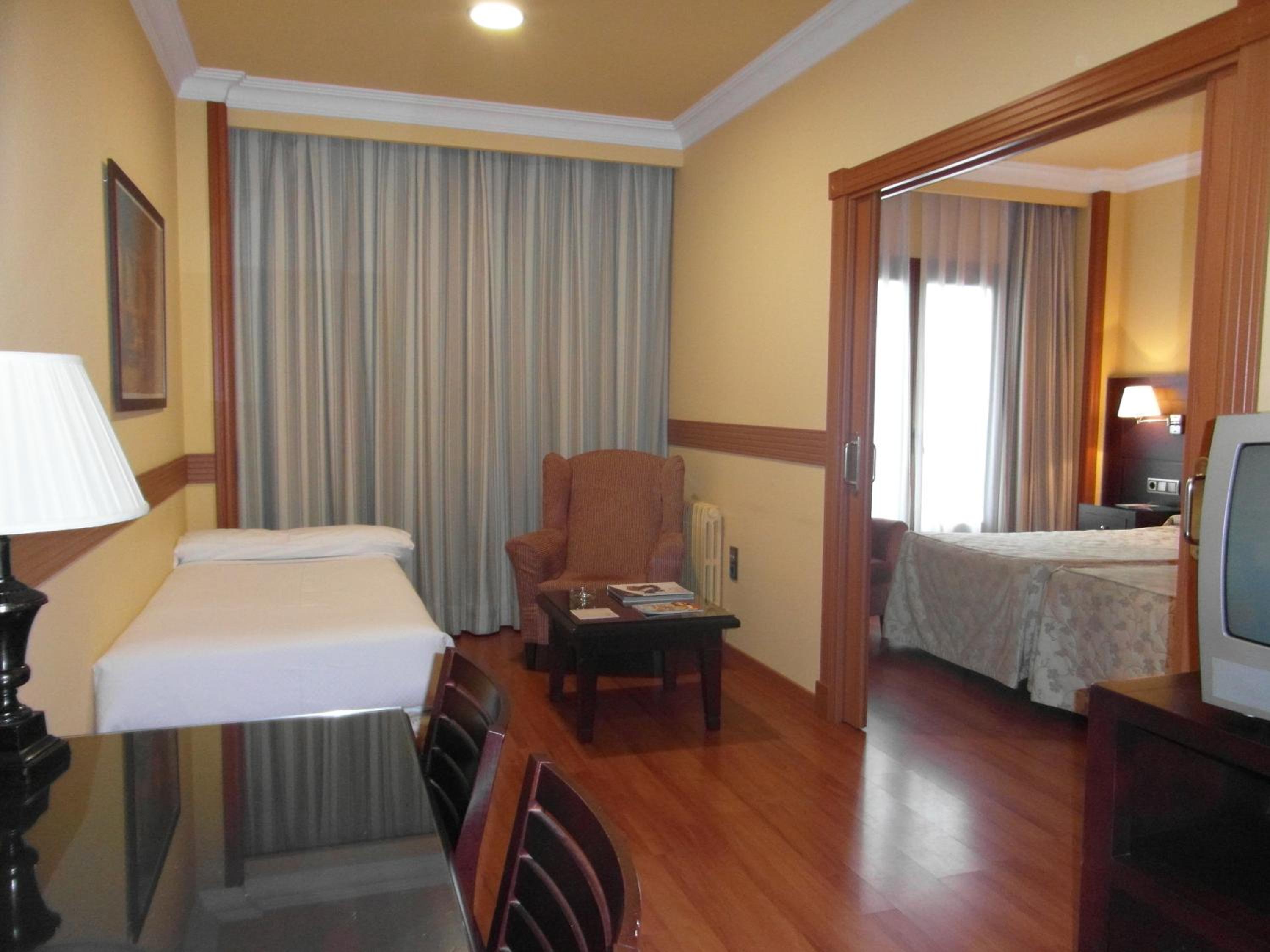 Double Room with Extra Bed (2 Adults + 1 Child)