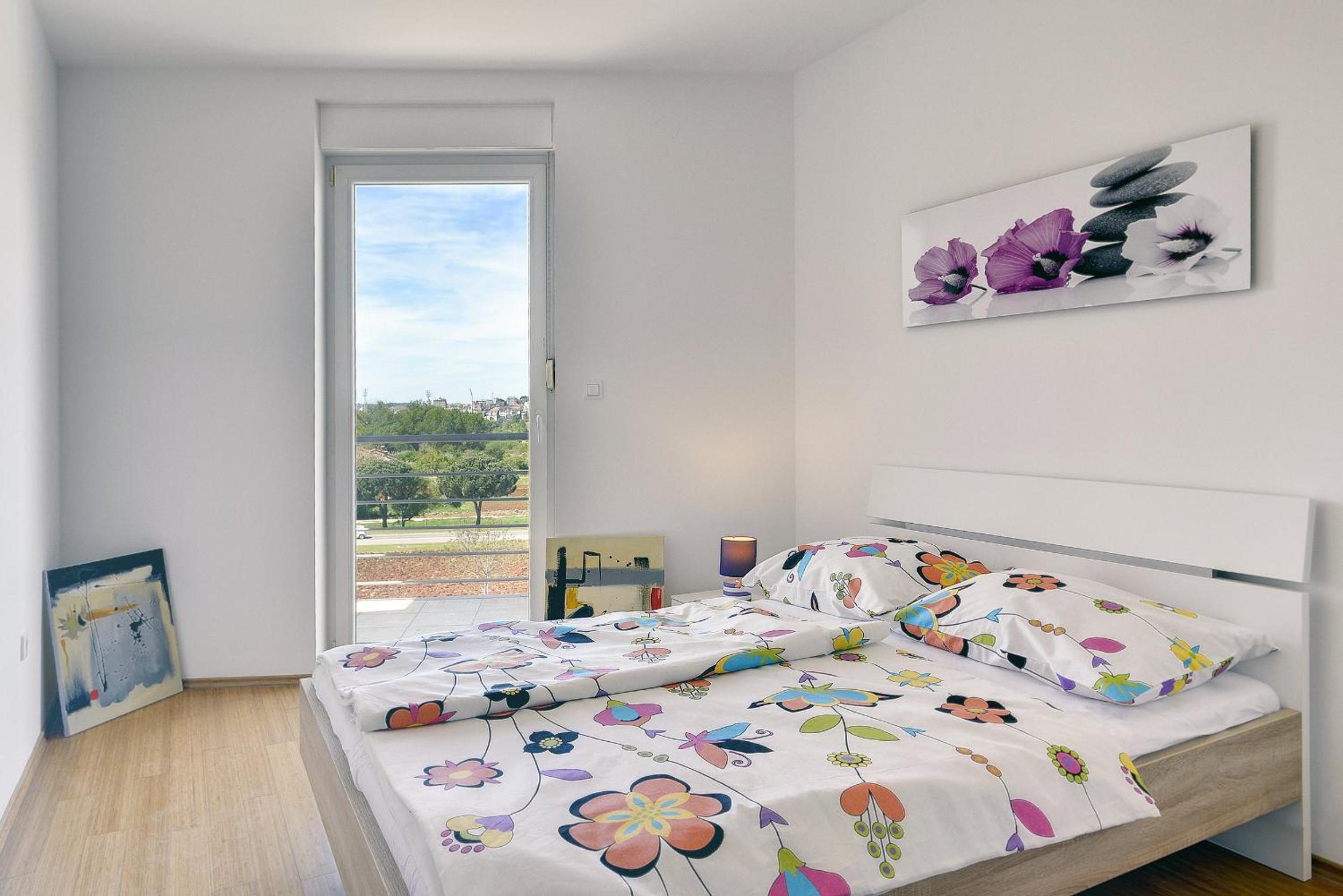 Two-Bedroom Apartment with Balcony