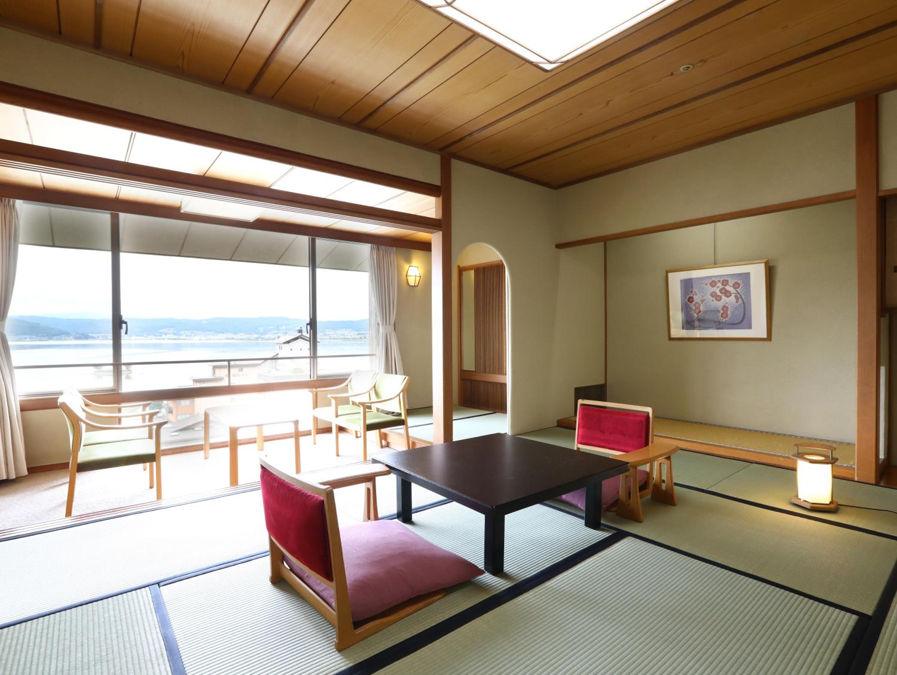 Quadruple Room with Lake View - Photo 1