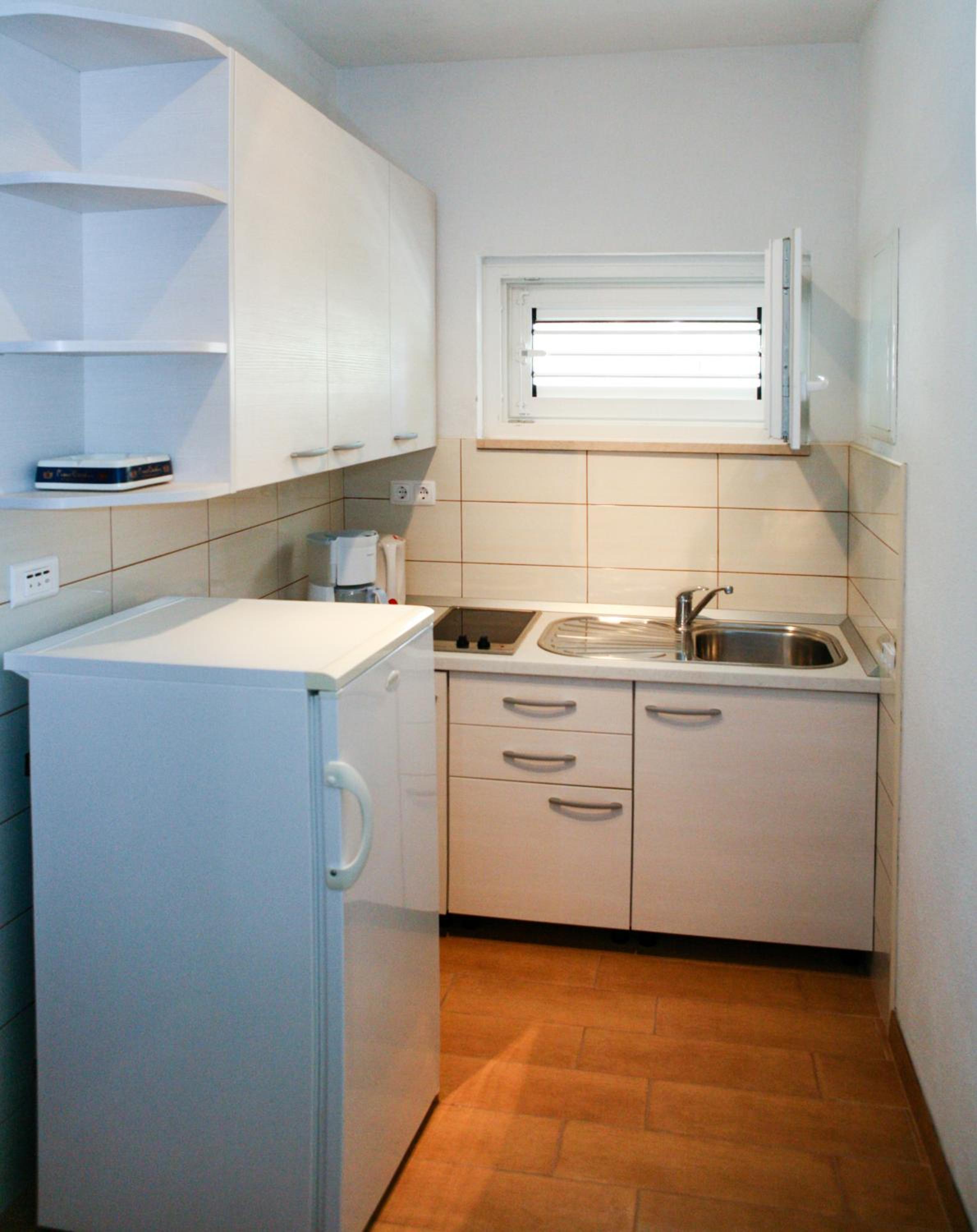 Three-Bedroom Apartment photo 1