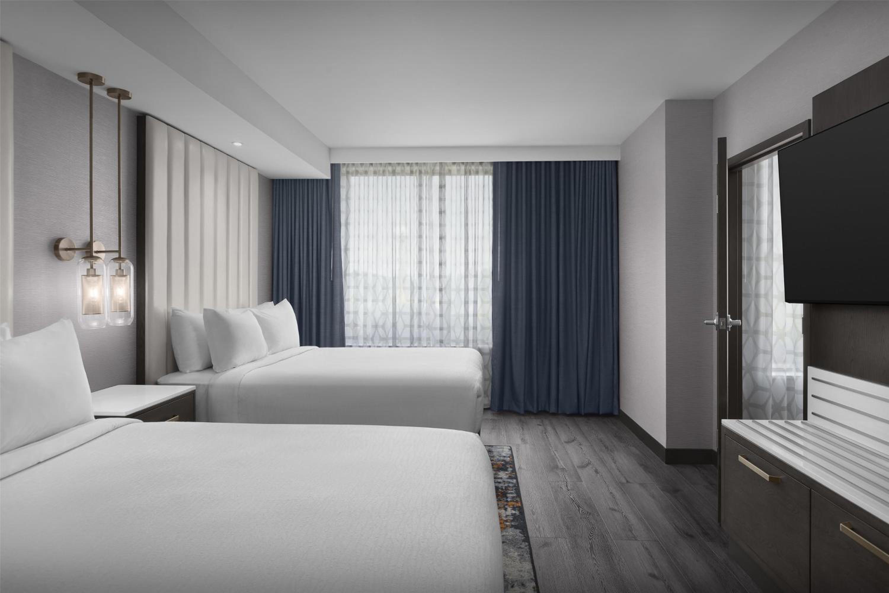 Two-Room Queen Suite with Two Queen Beds - Photo 1