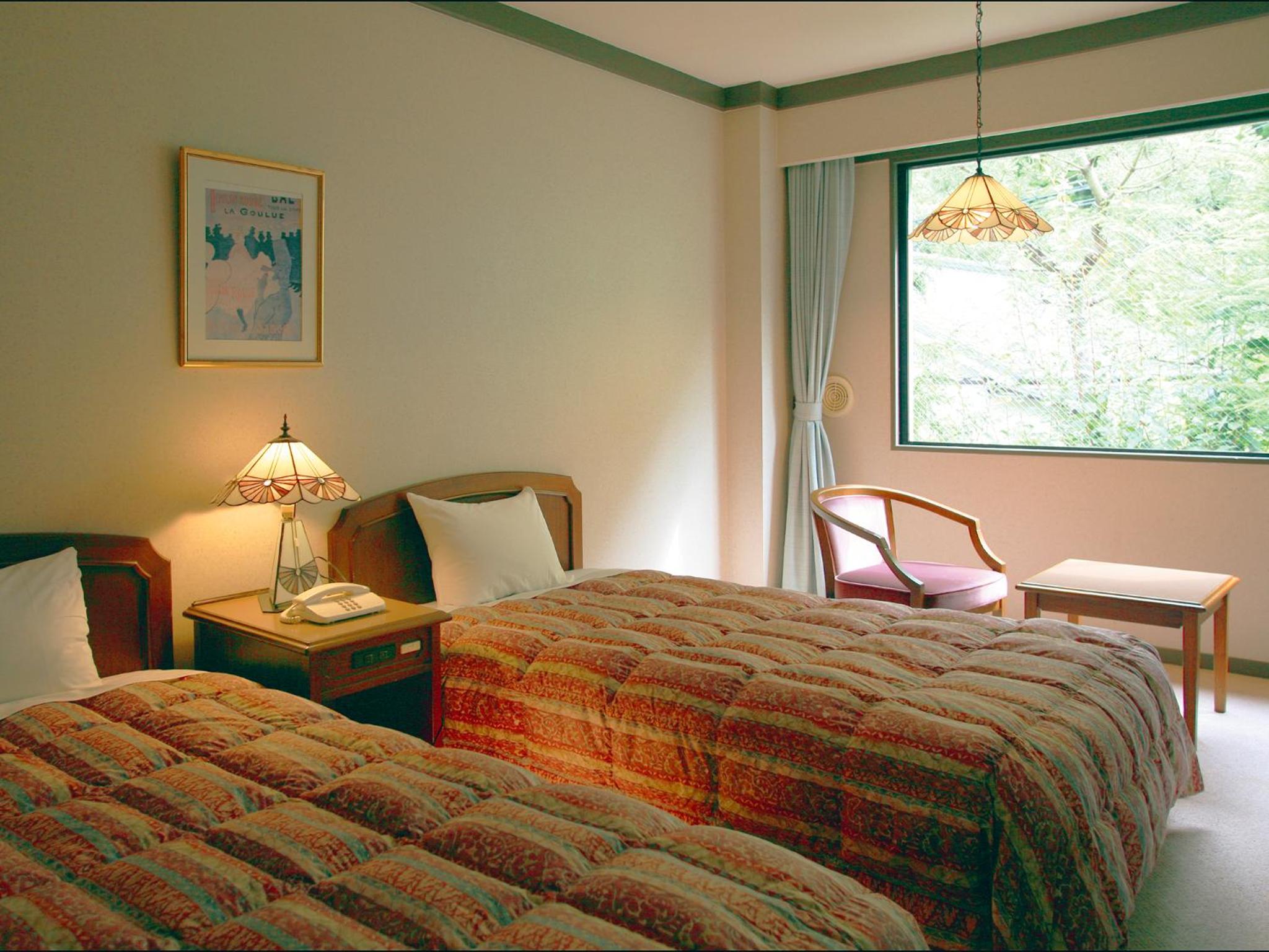 Twin Room - Photo 1