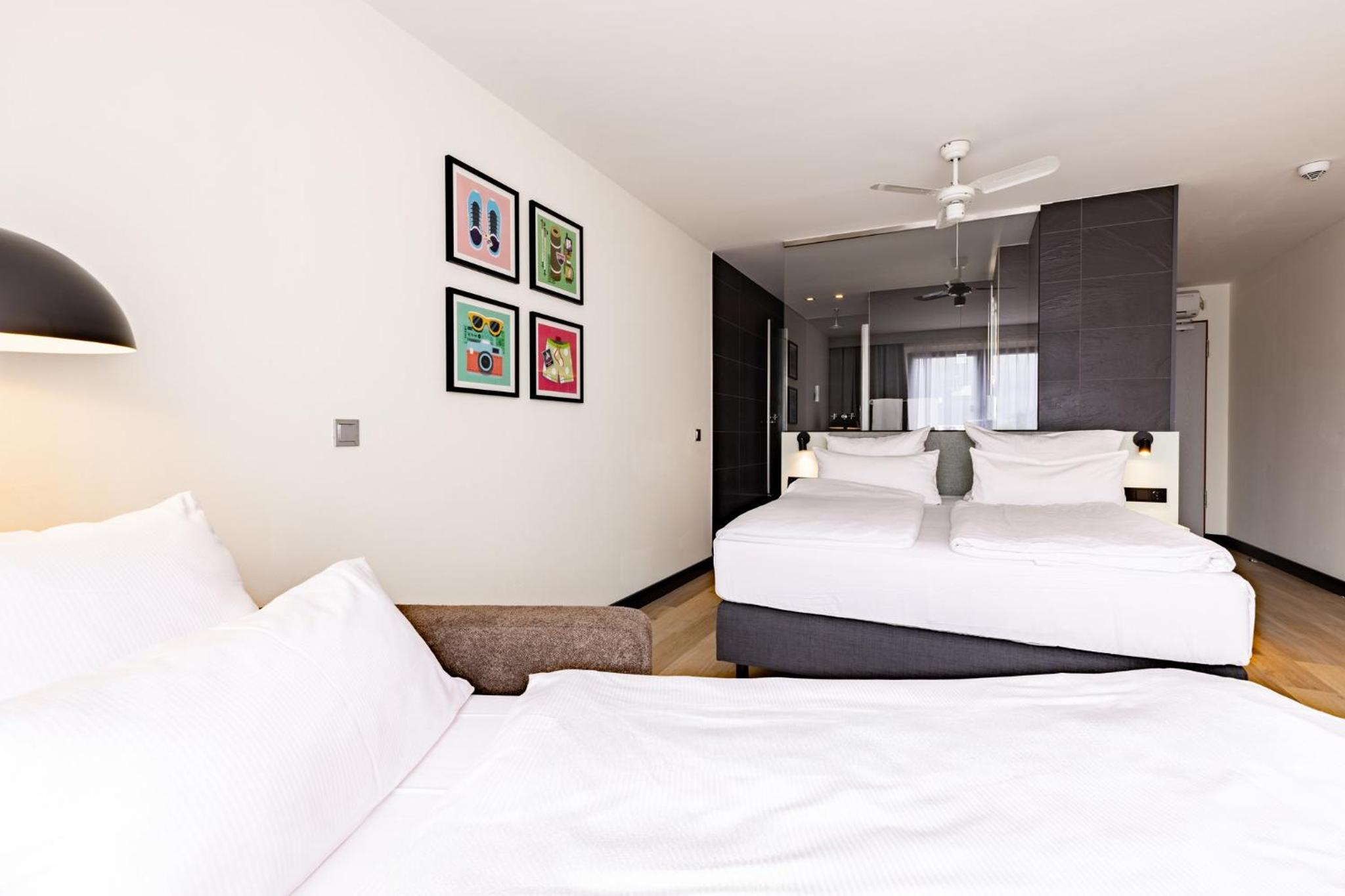 Standard Family Twin Room with Single Sofa Bed - Photo 1