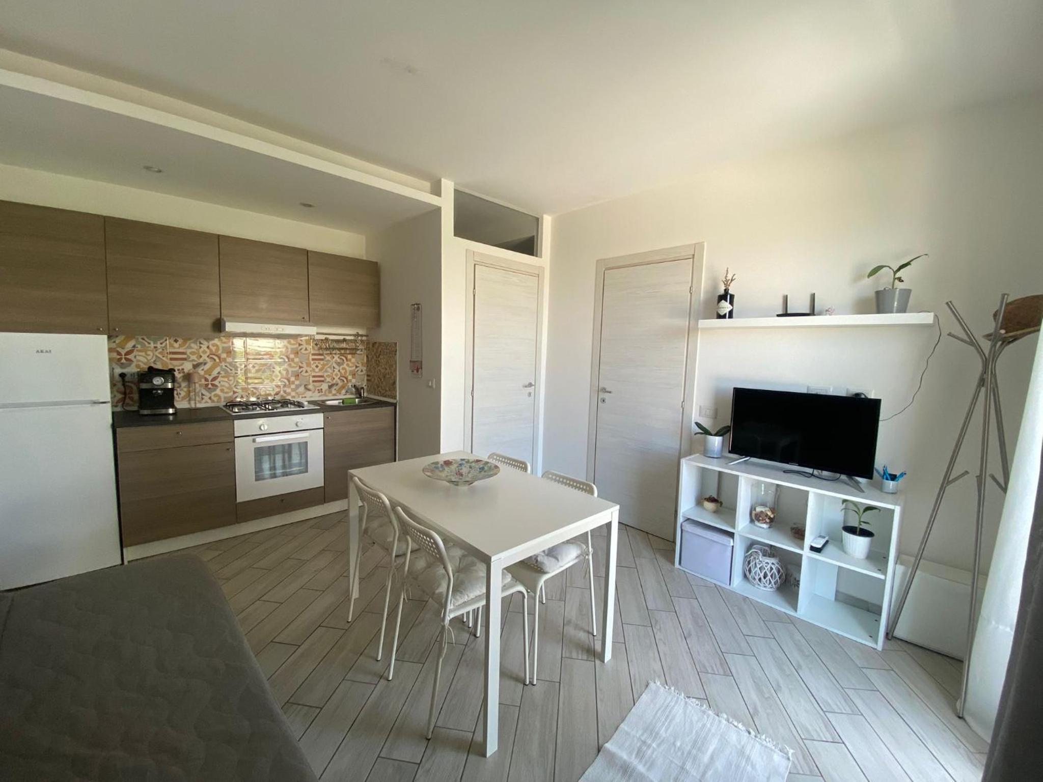 One-Bedroom Apartment with Balcony and Sea View