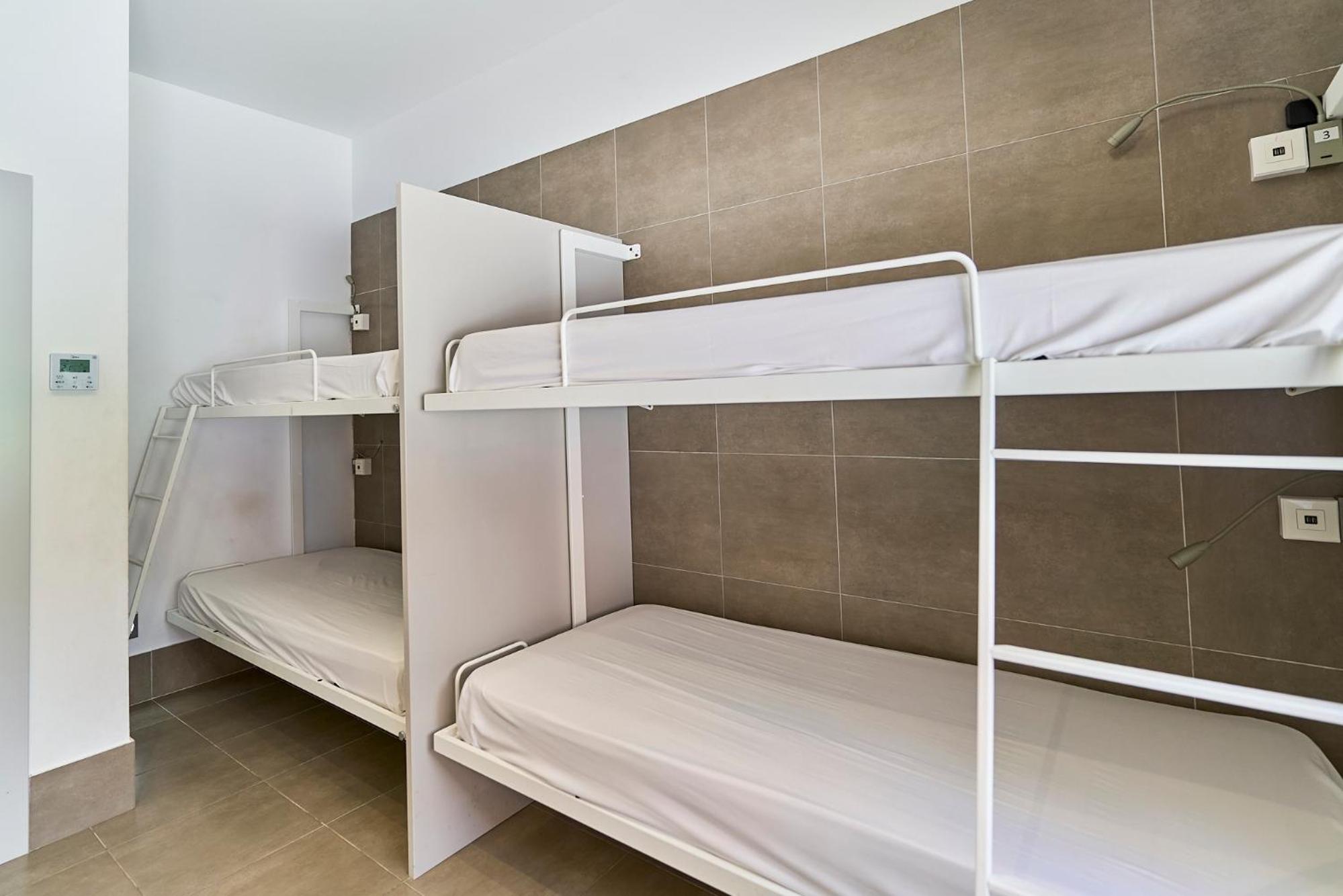 Single Bed in Dormitory Room
