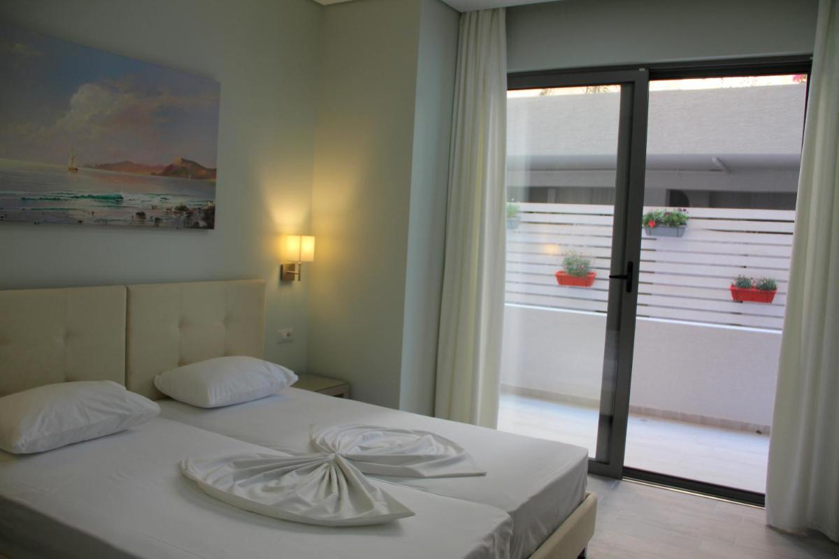Double Room with Garden View and Side Sea View
