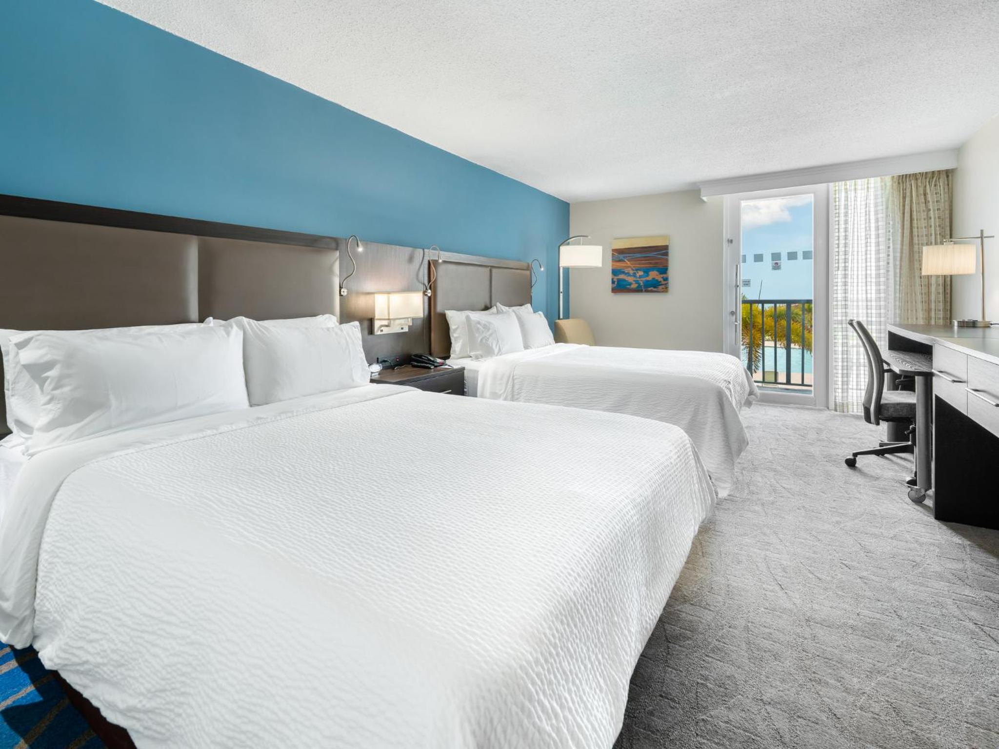 Standard Queen Room with Two Queen Beds and Pool View - Photo 1