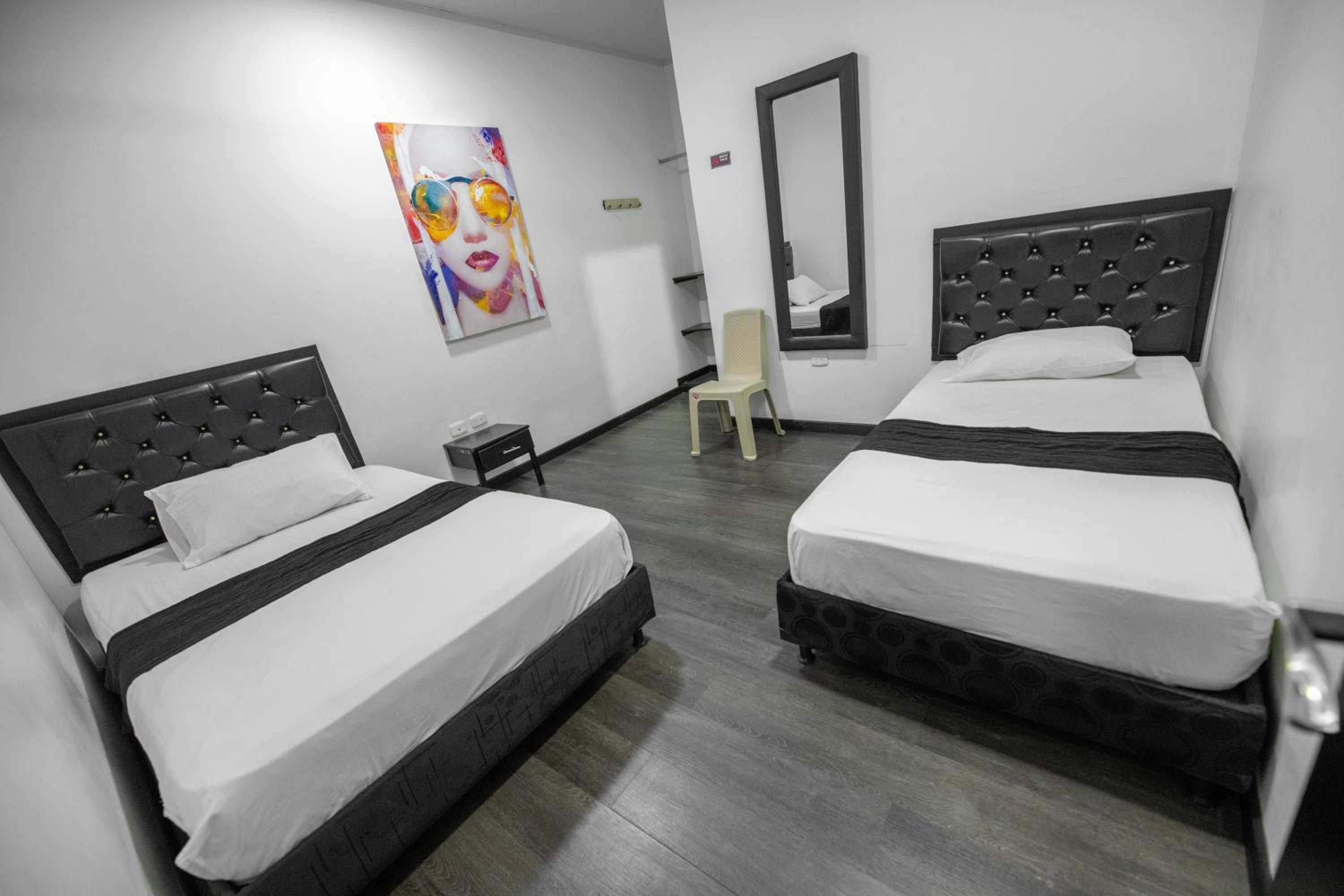 Deluxe Queen Room with Two Queen Beds photo 2