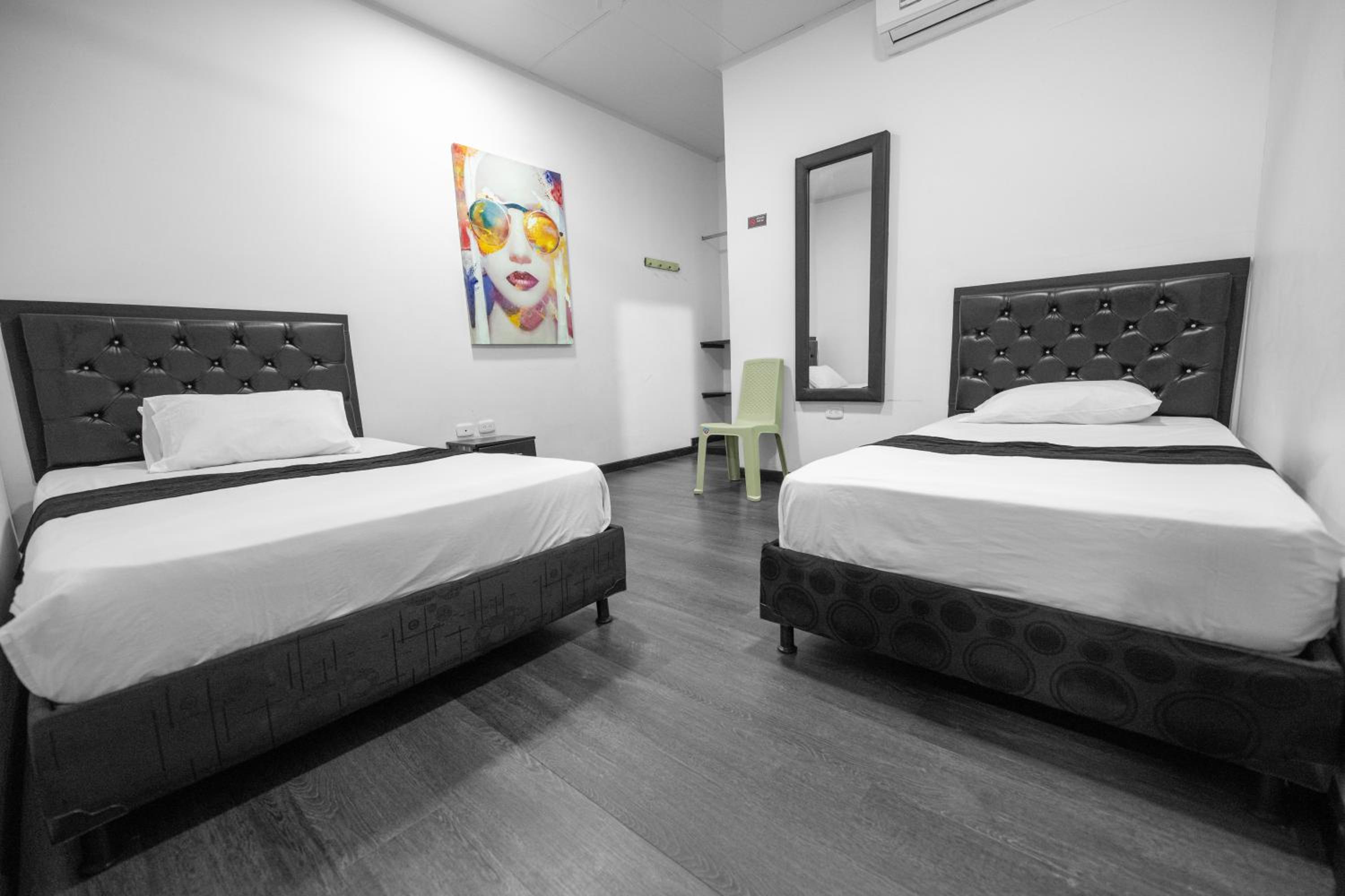 Deluxe Queen Room with Two Queen Beds photo 1