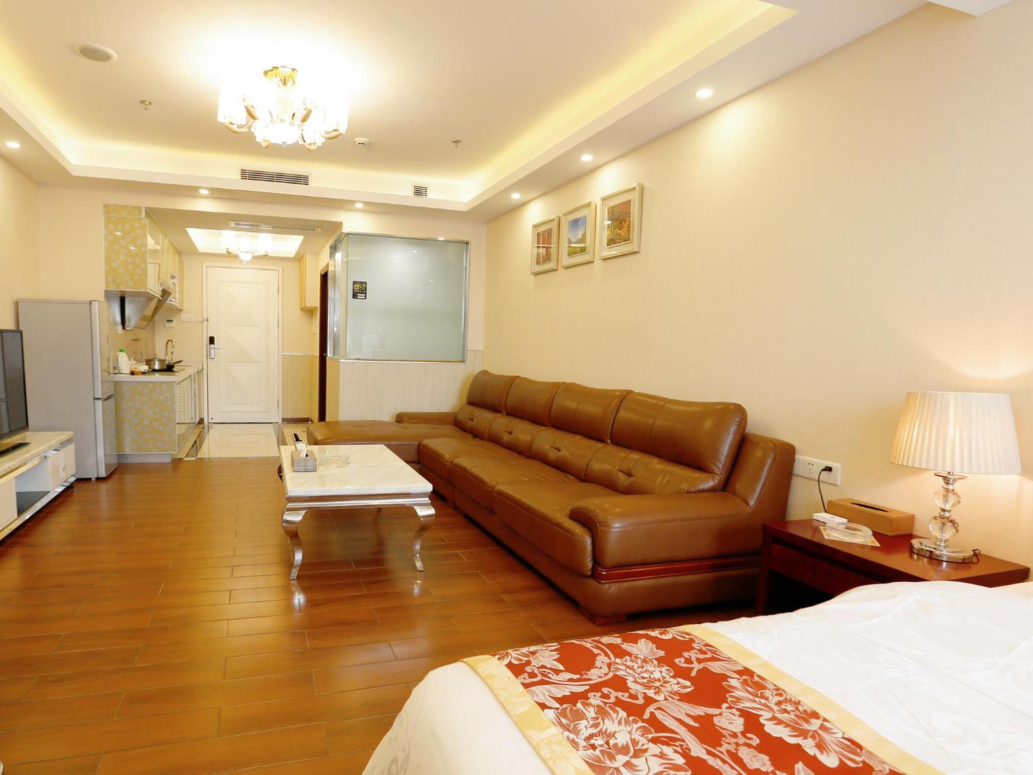 Deluxe Queen Room - Photo 7