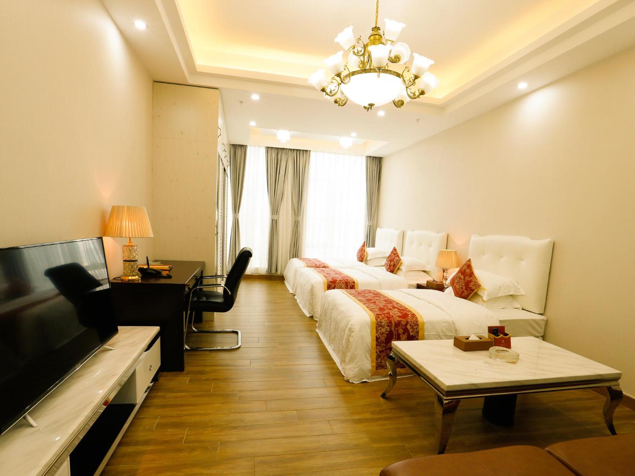Deluxe Triple Room - Photo 1