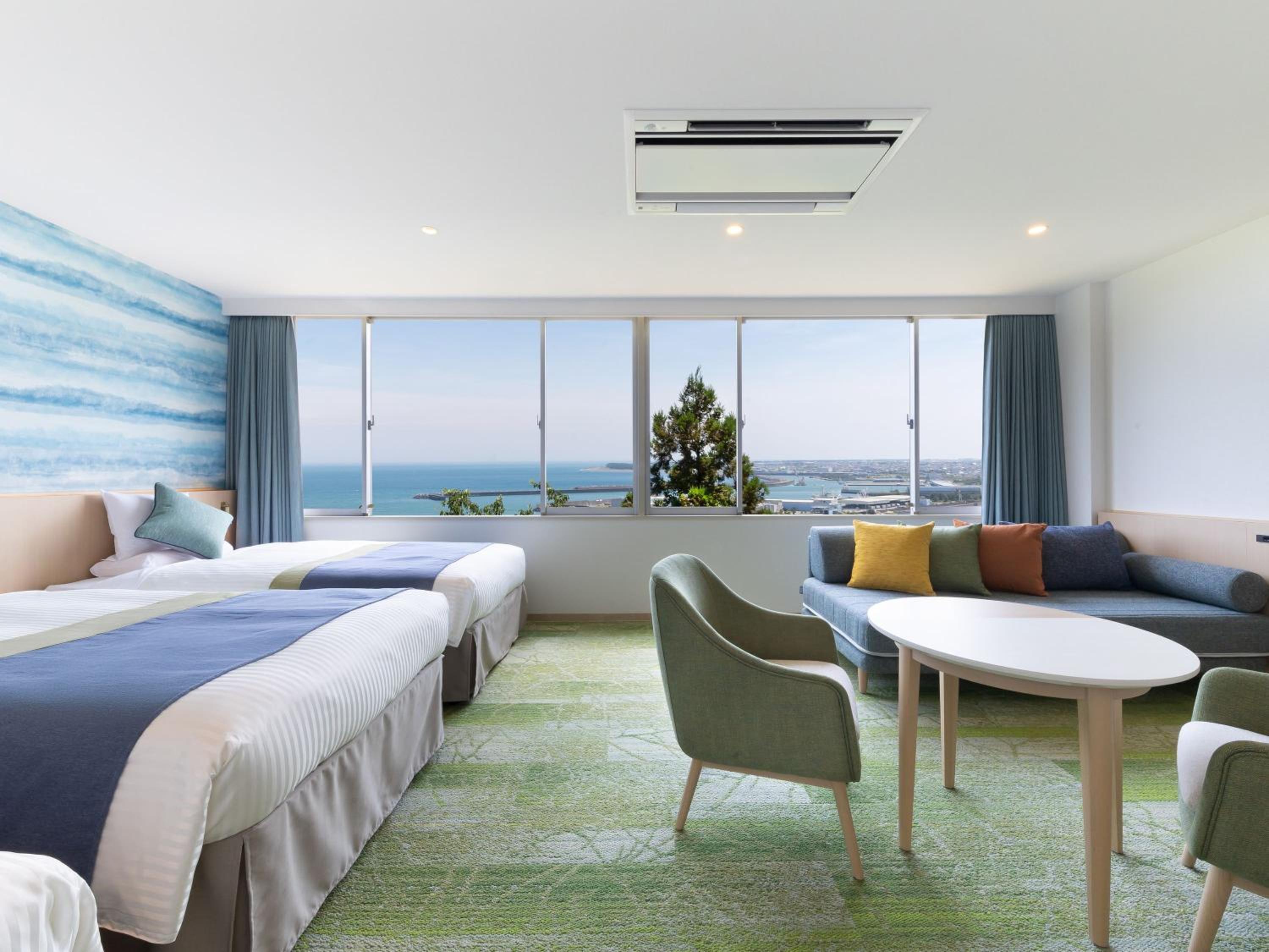 Ocean View Deluxe Family Room with Private Bathroom photo 3