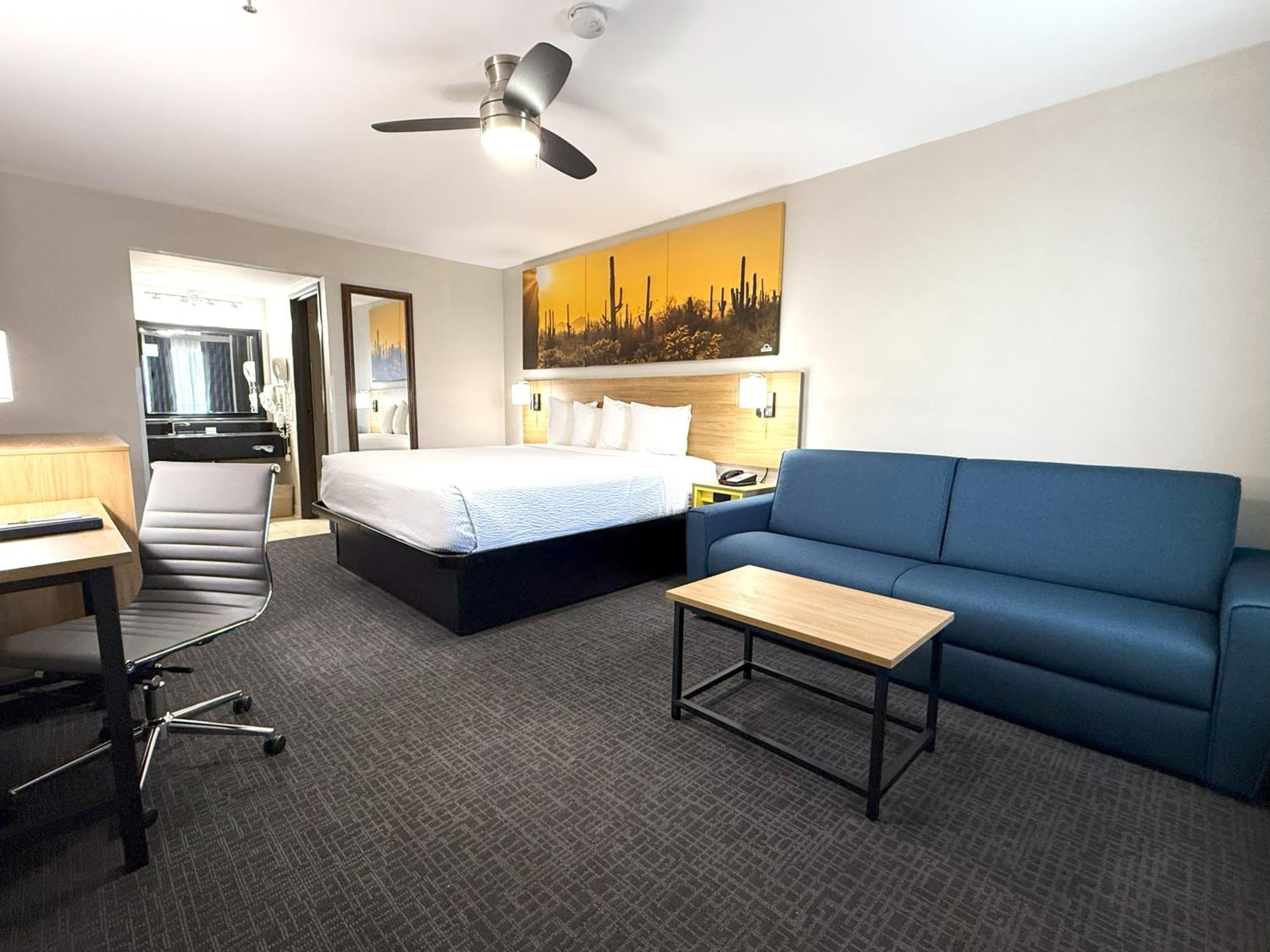 Deluxe Room with One King Bed and One Sofa Bed, Non-Smoking - Photo 1