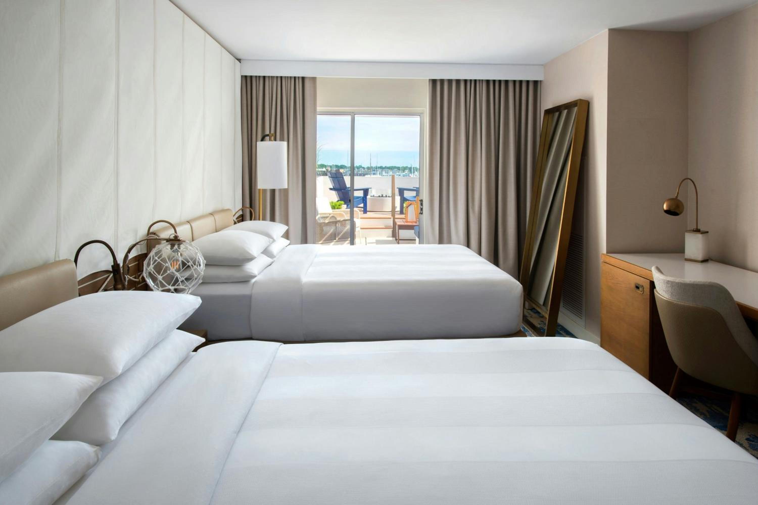 Queen Room with Two Queen Beds and Balcony - Water View - Photo 4