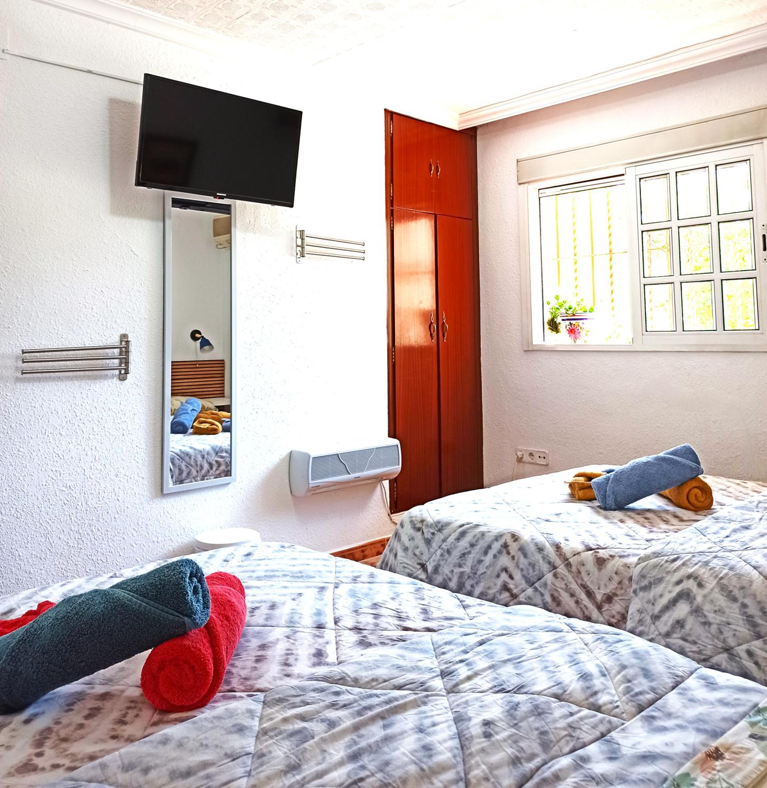 Quadruple Room with Shared Bathroom