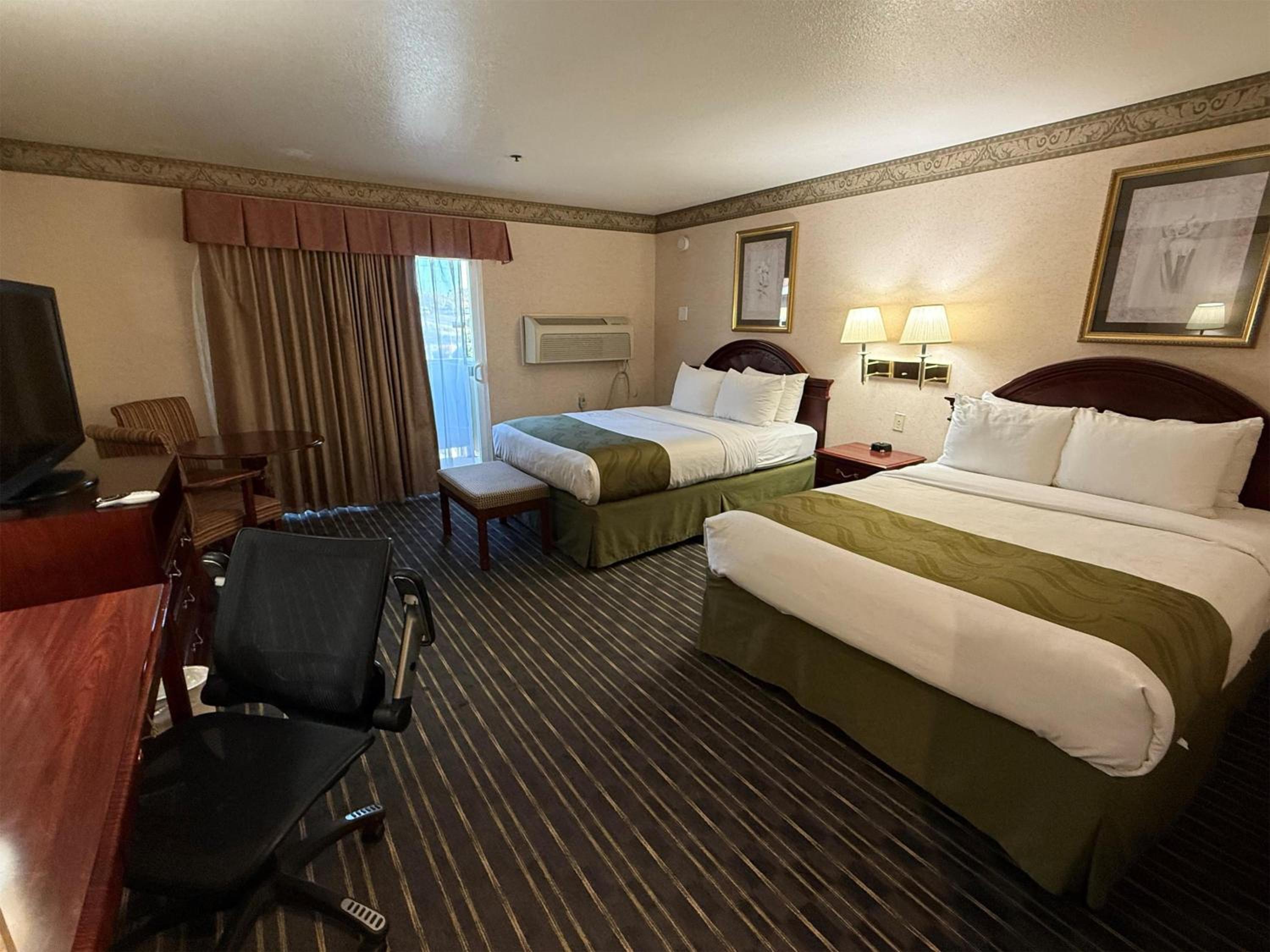 Queen Room with Two Queen Beds and Balcony - Non-Smoking photo 1