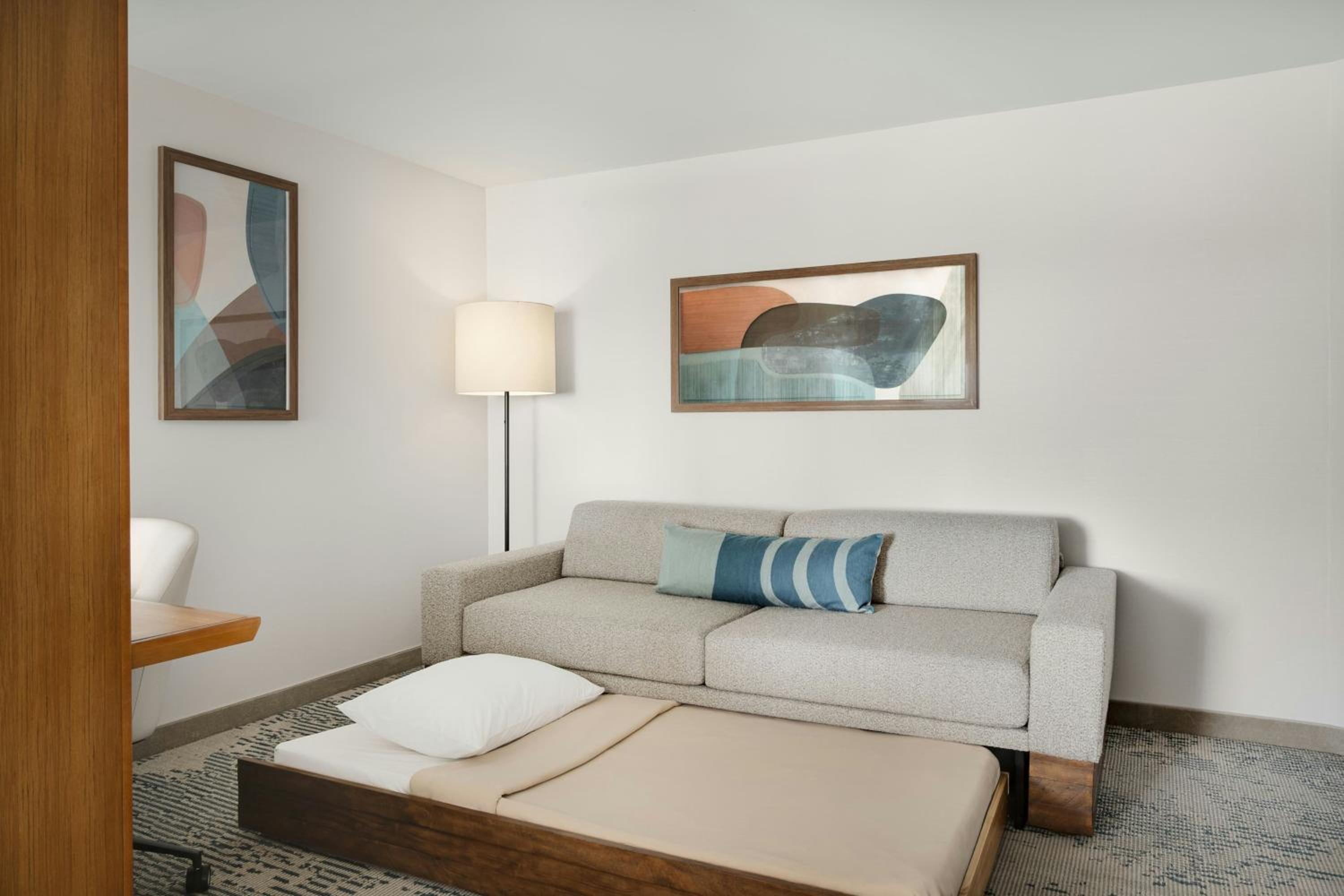 King Suite with Trundle Sofa - Hearing Accessible photo 1