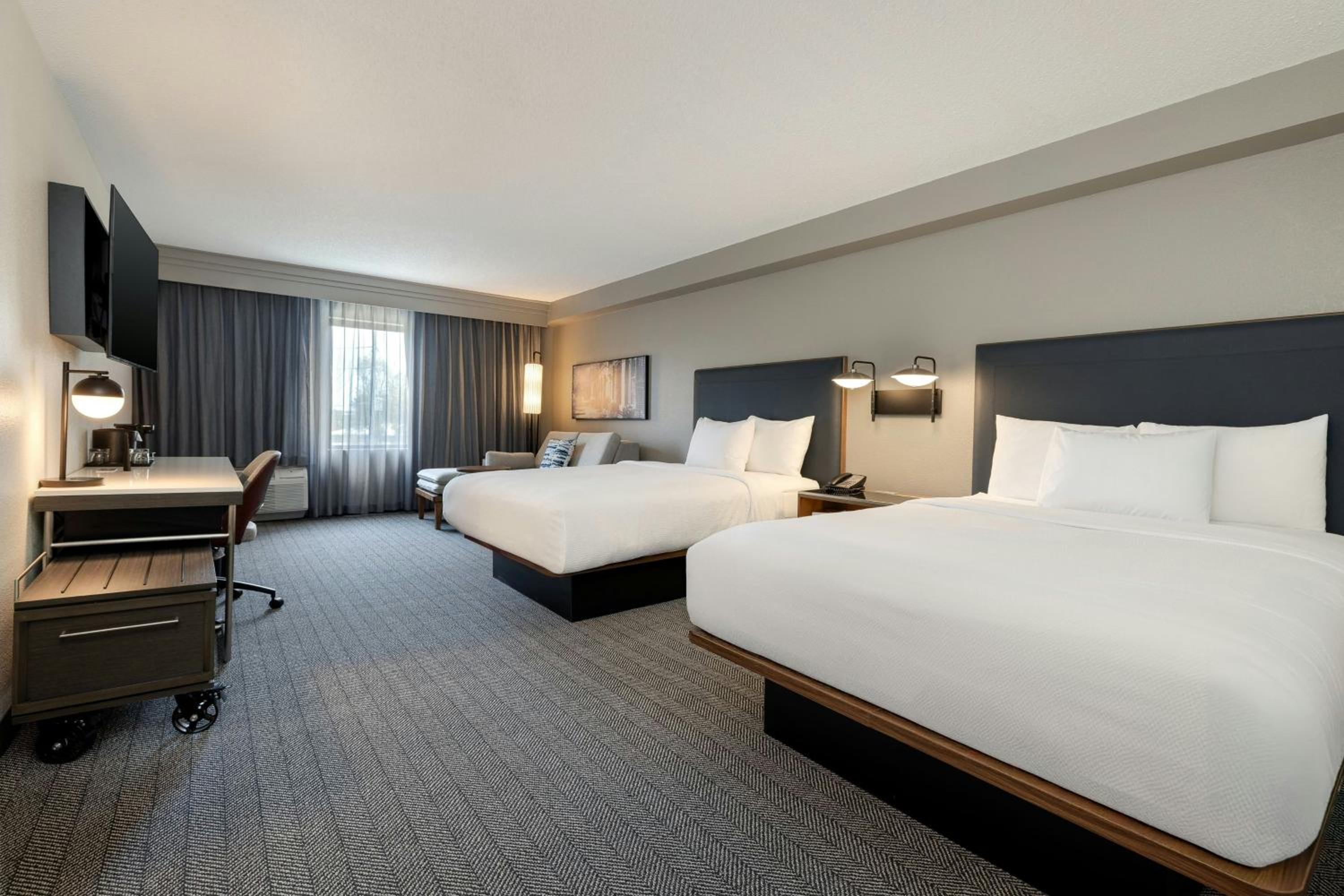 Queen Room with Two Queen Beds and Sofa Bed