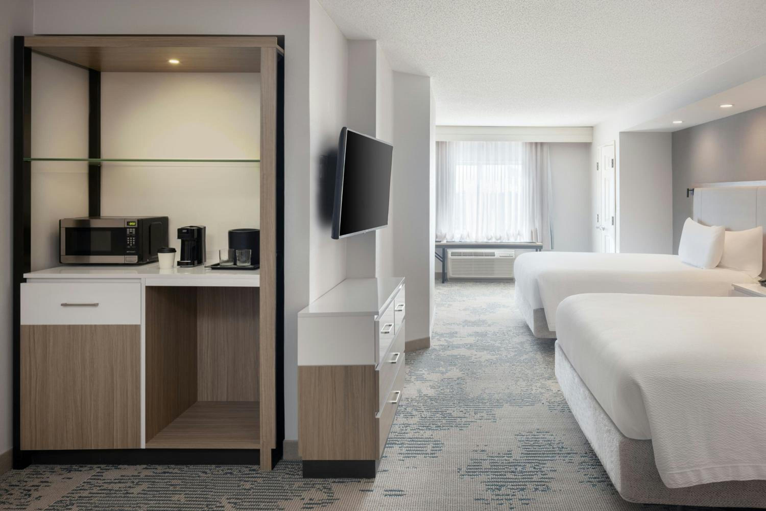 Queen Suite with Two Queen Beds and Trundle Sofa - Photo 1