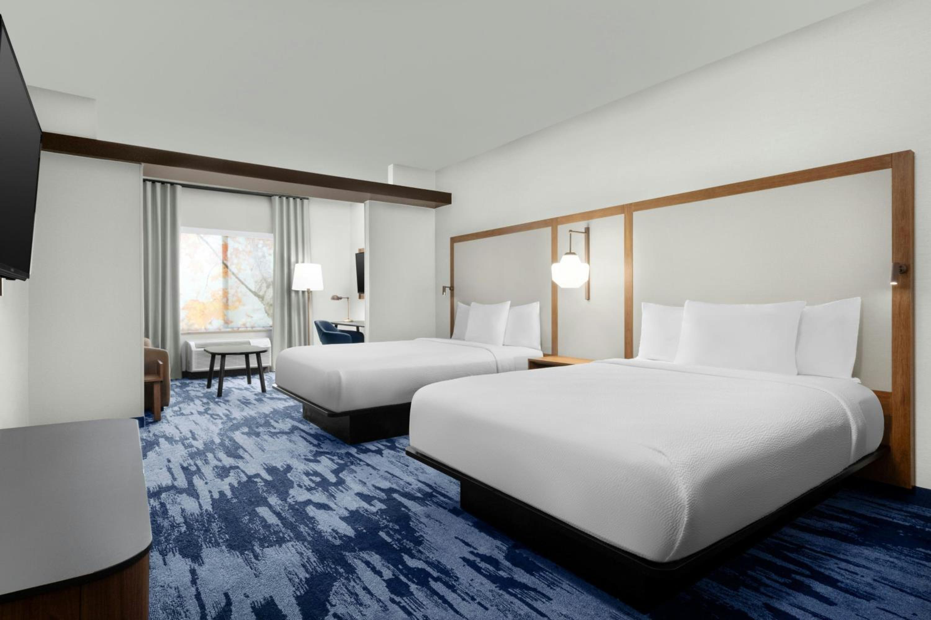 Queen Suite with Two Queen Beds and Sofa Bed