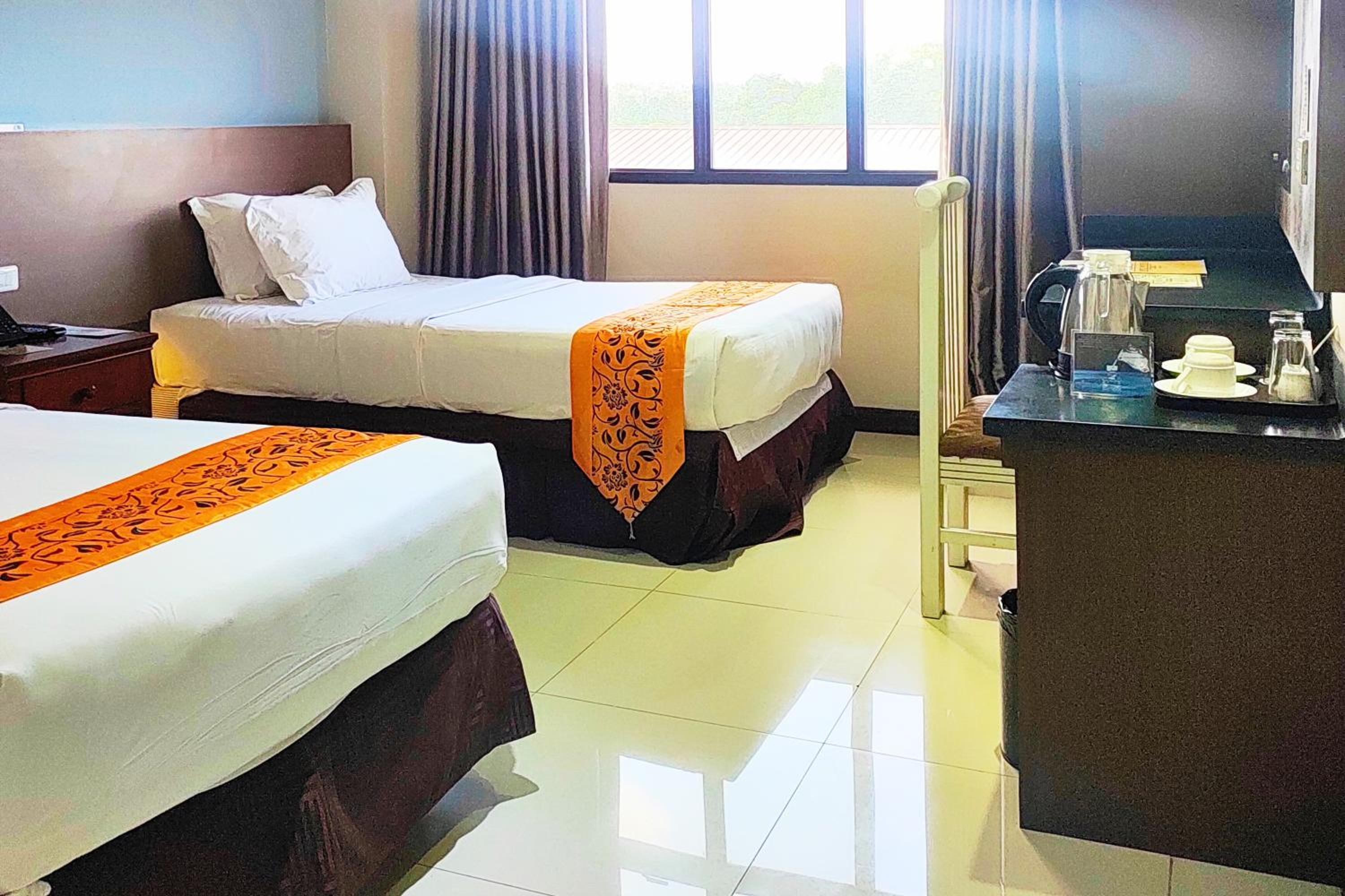 Deluxe Twin Room - Photo 10