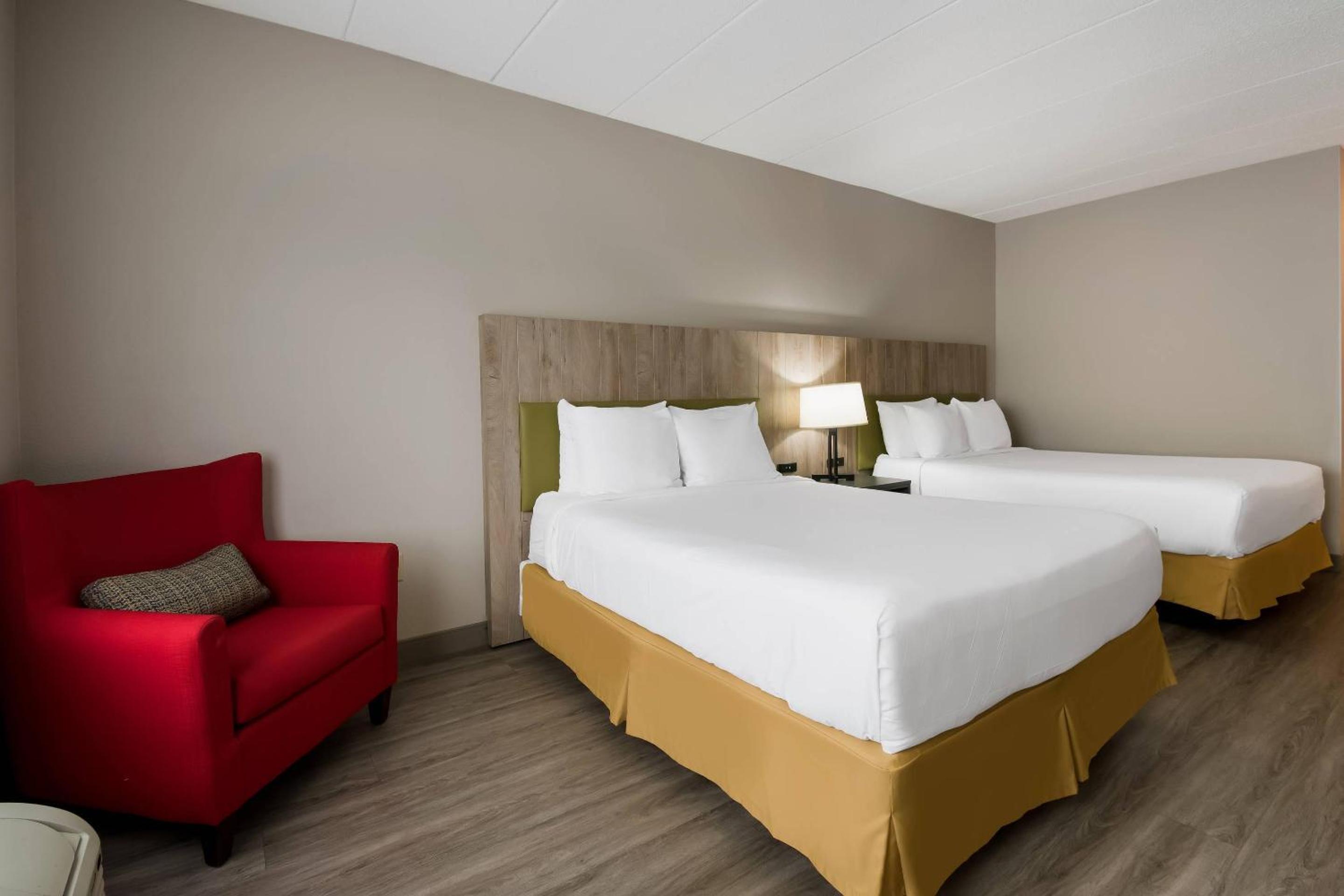 Queen Room with Two Queen Beds - Photo 1